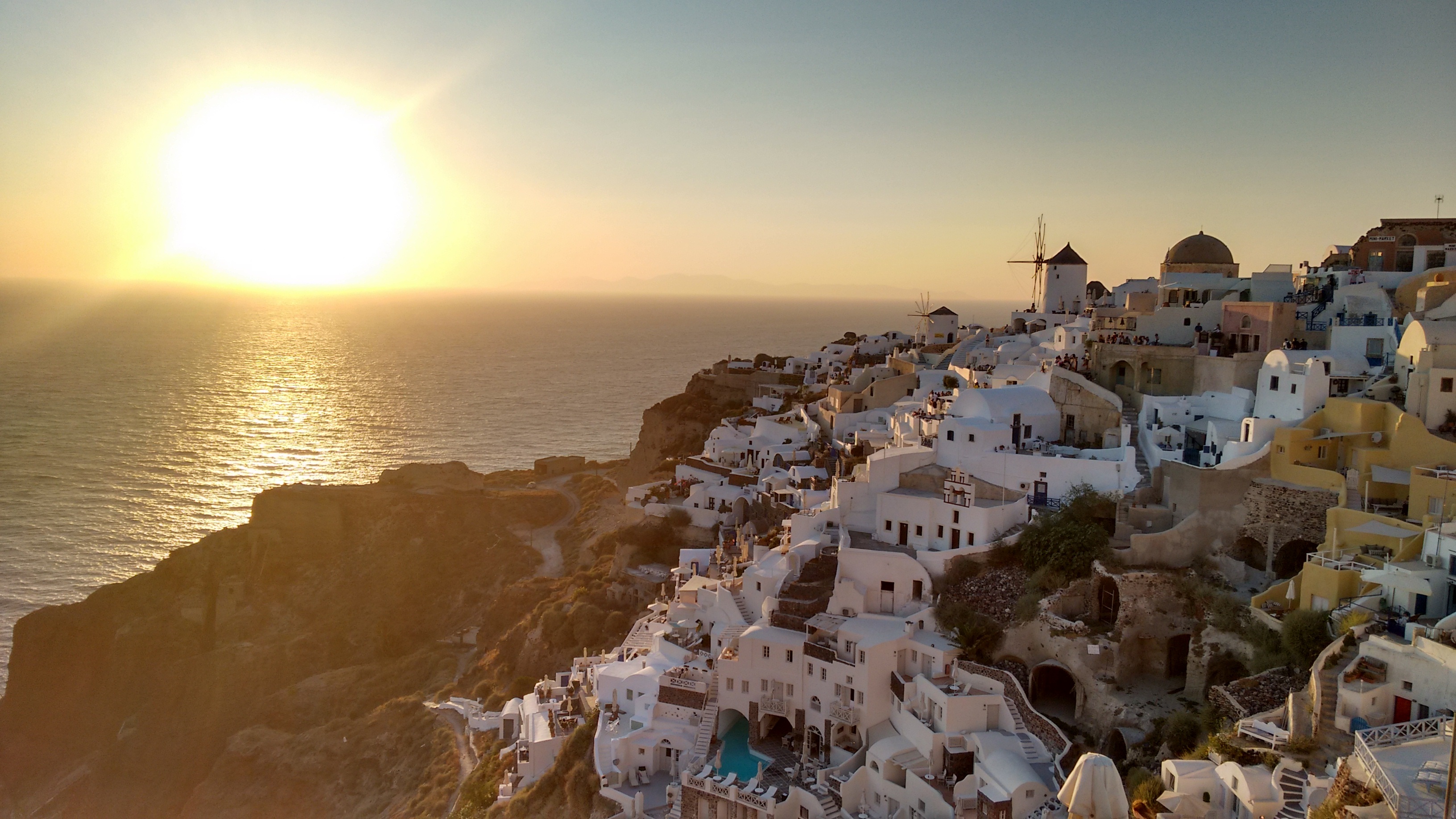 horizon over water, santorini, sea, sun, outdoors, architecture, beach, sunlight, building exterior, travel destinations, beauty in nature, building, nature, HD Wallpaper