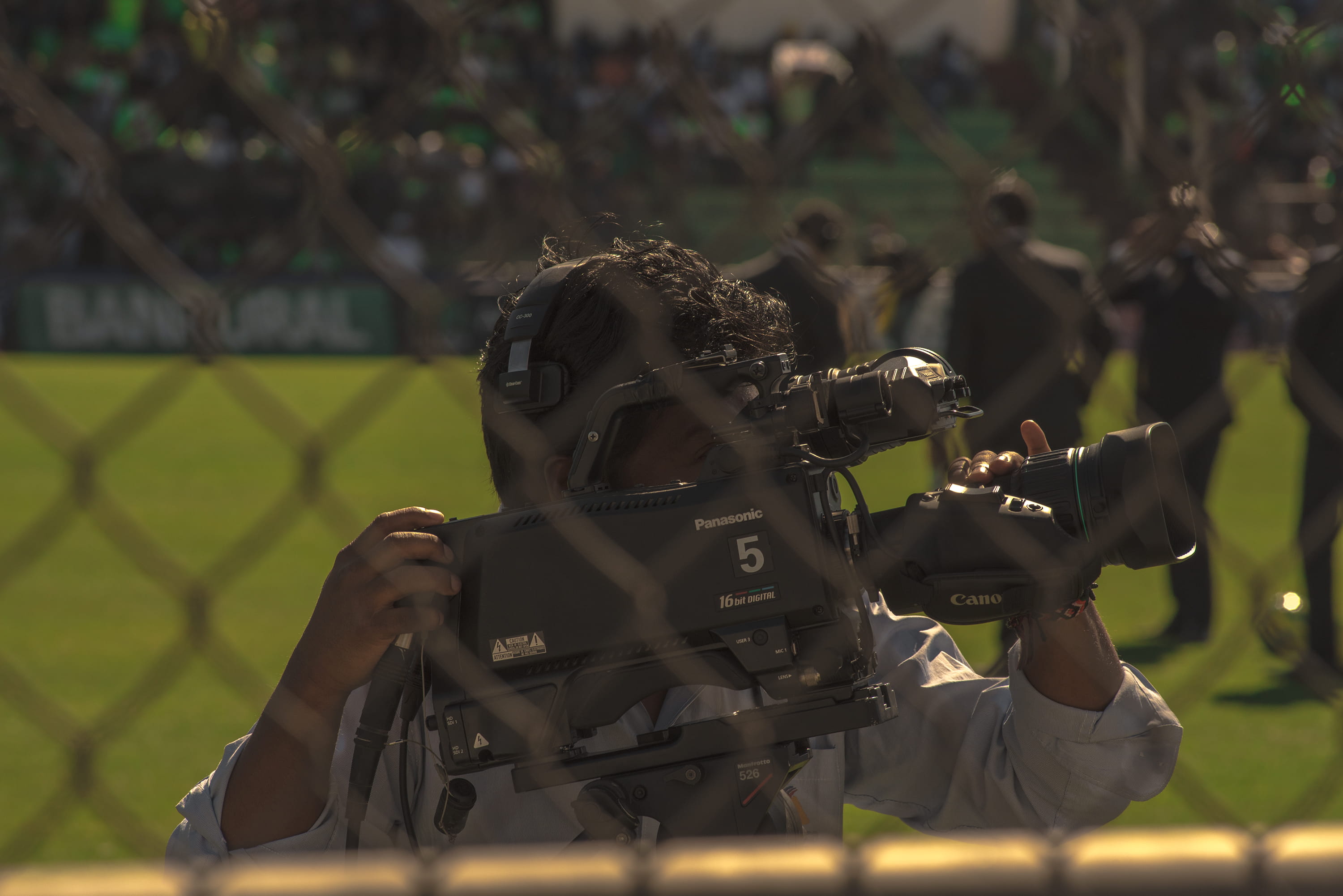 photographing, protection, selective focus, canon, field, photography themes, outdoors, security, 2K, people, camera man, day, holding, panasonic, nature, HD Wallpaper