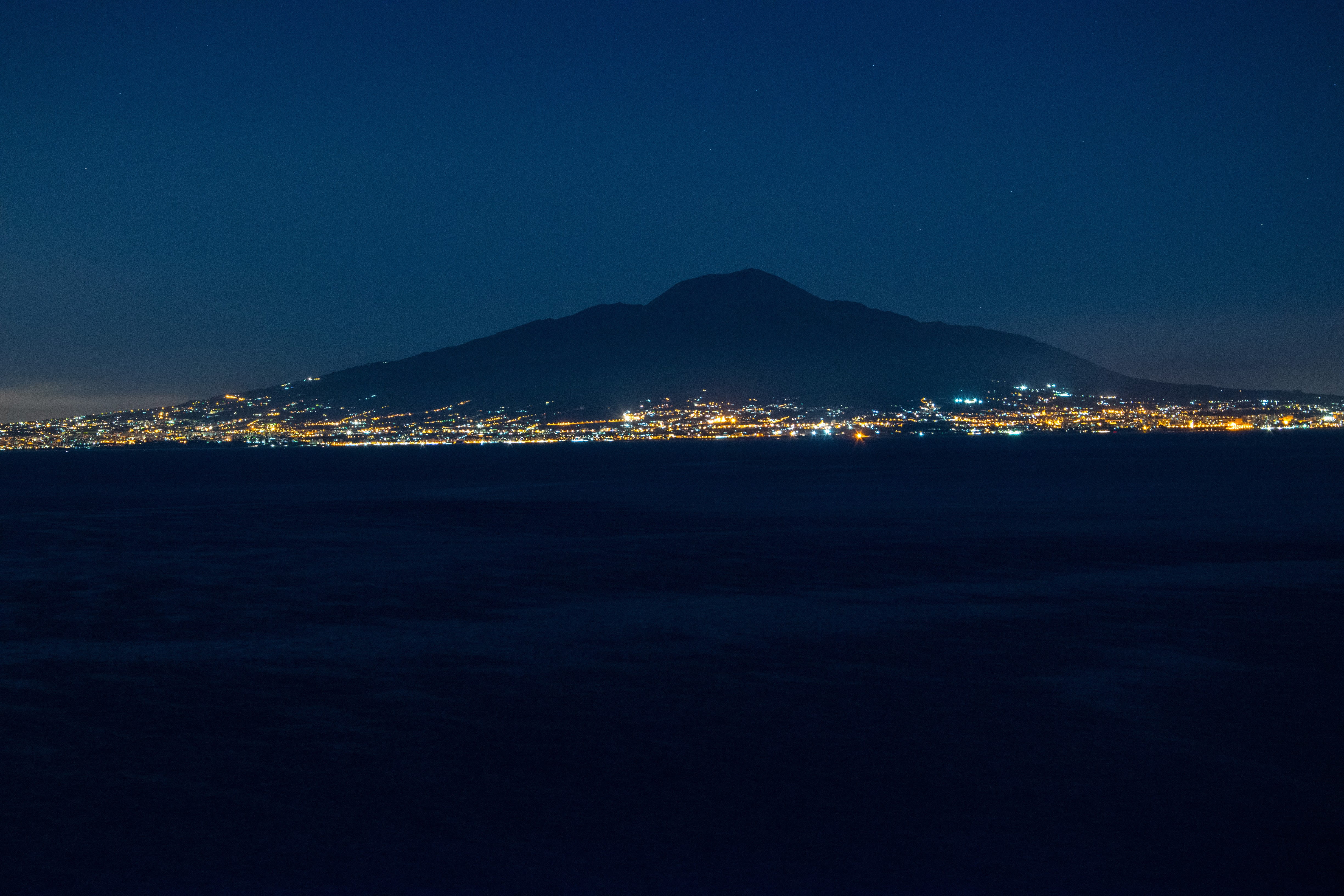 cityscape, blue, beauty in nature, 4K, land, sky, tranquil scene, night, tranquility, scenics - nature, volcano, nature, copy space, sea, architecture, HD Wallpaper