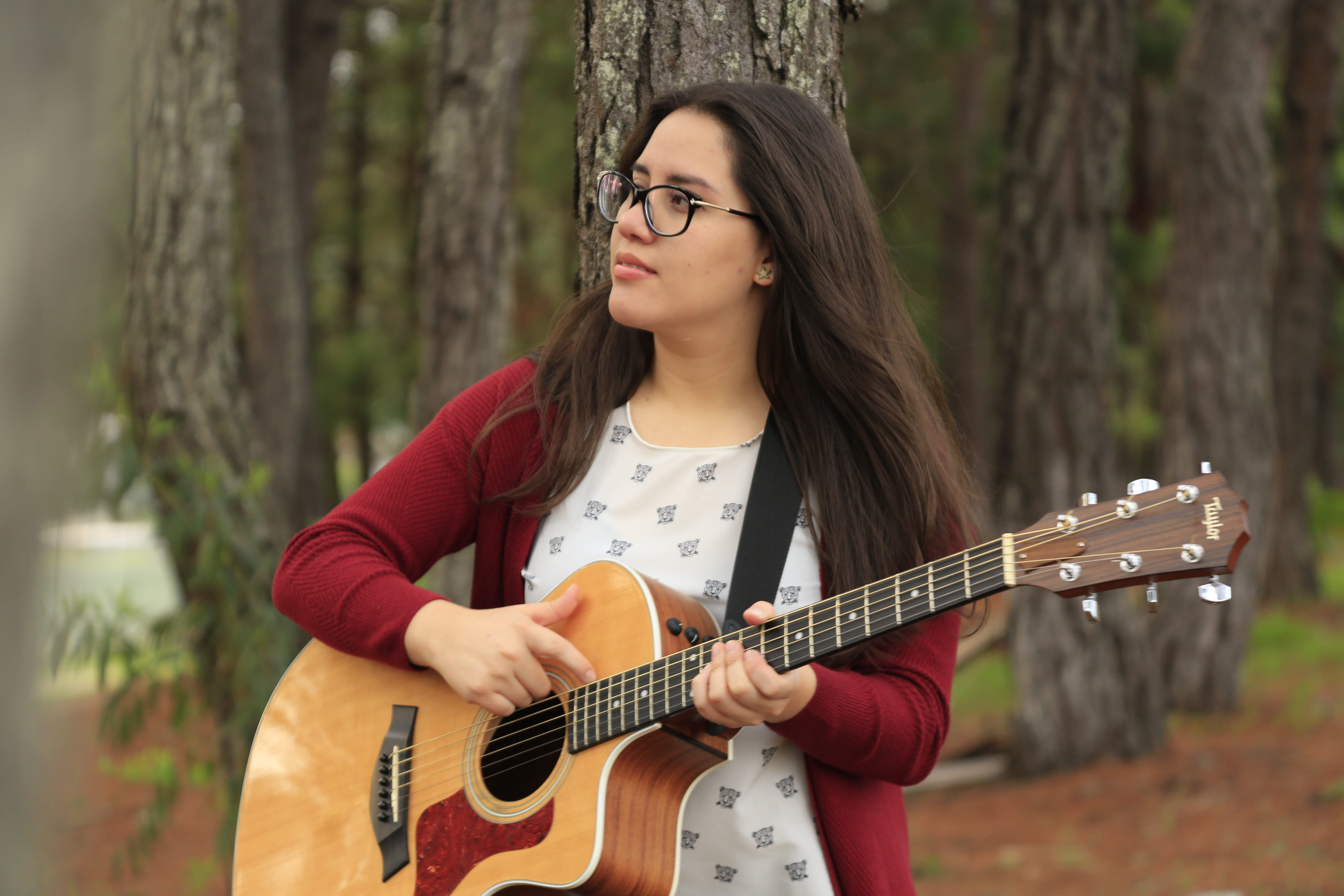 musical instrument, 5K, long hair, lifestyles, passion, casual clothing, holding, hair, playing, women, leisure activity, eyeglasses, front view, one person, HD Wallpaper
