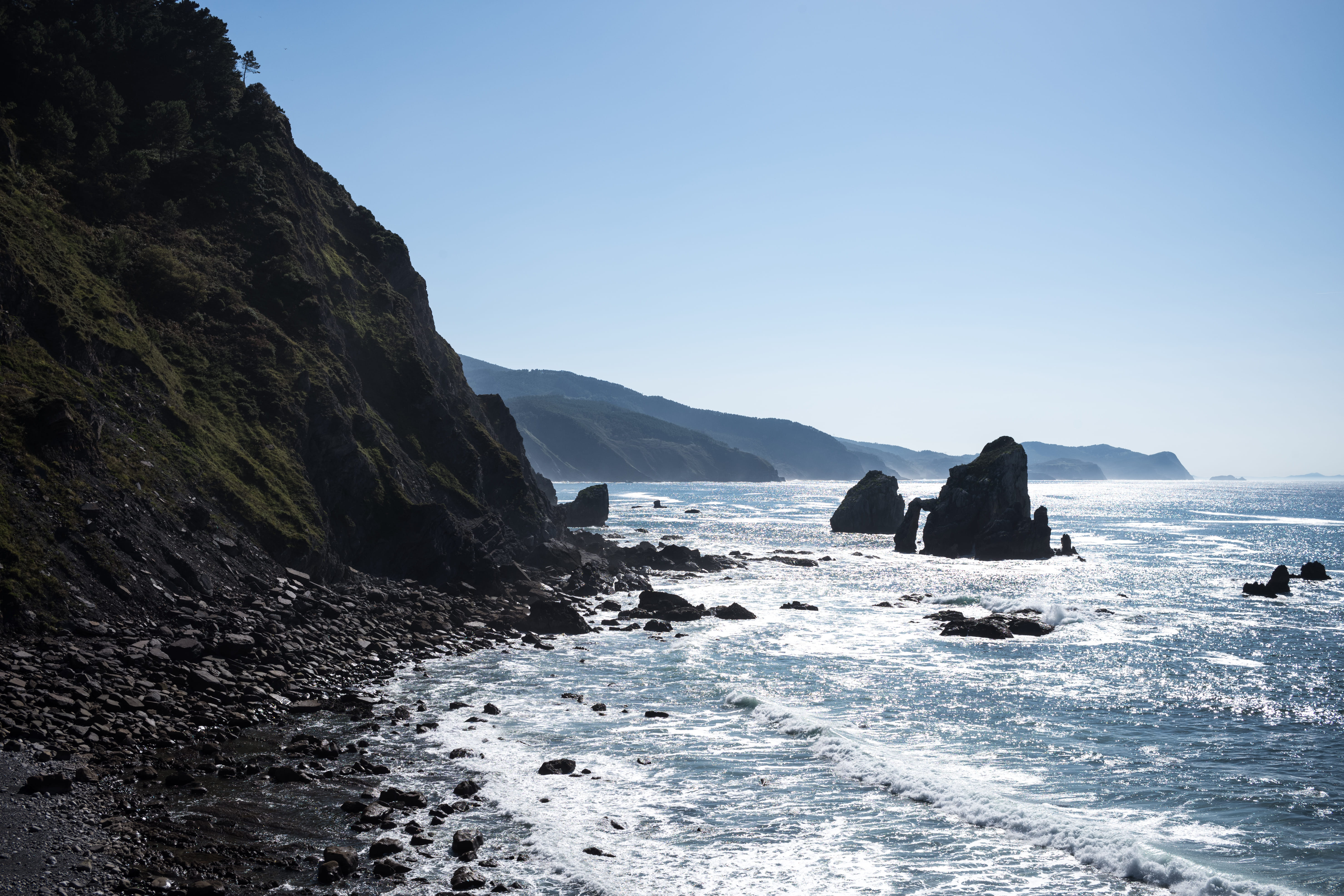 rock formation, rough, water, wave, land, ocean, sunlight, sky, rock - object, coast, tranquil scene, solid, waves, sea, clear sky, outdoors, no people, HD Wallpaper