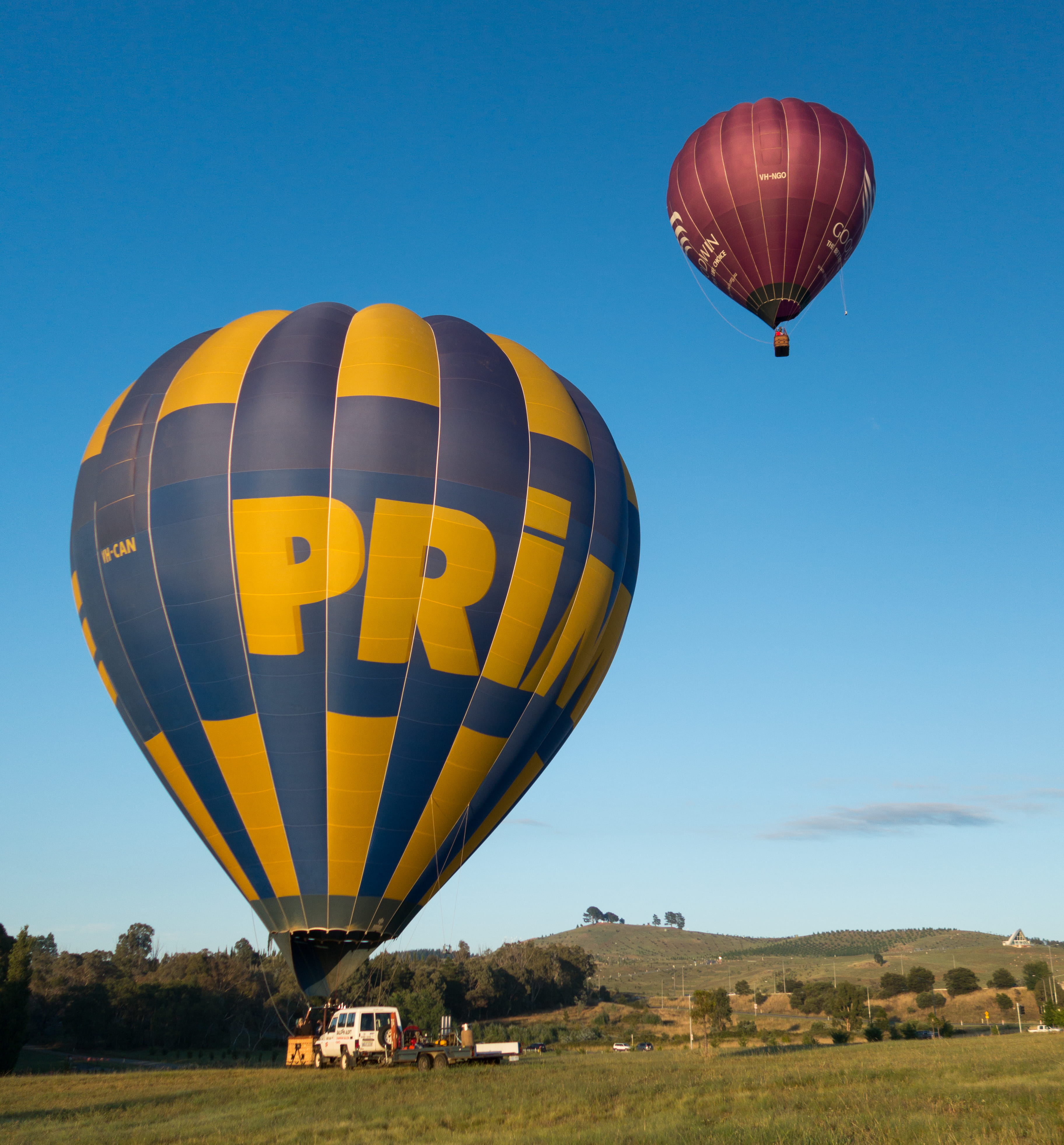 hot air balloon, flying, freedom, adventure, air vehicle, environment, outdoors, clear sky, land, landscape, canberra, transportation, travel, multi colored, Phone HD Wallpaper