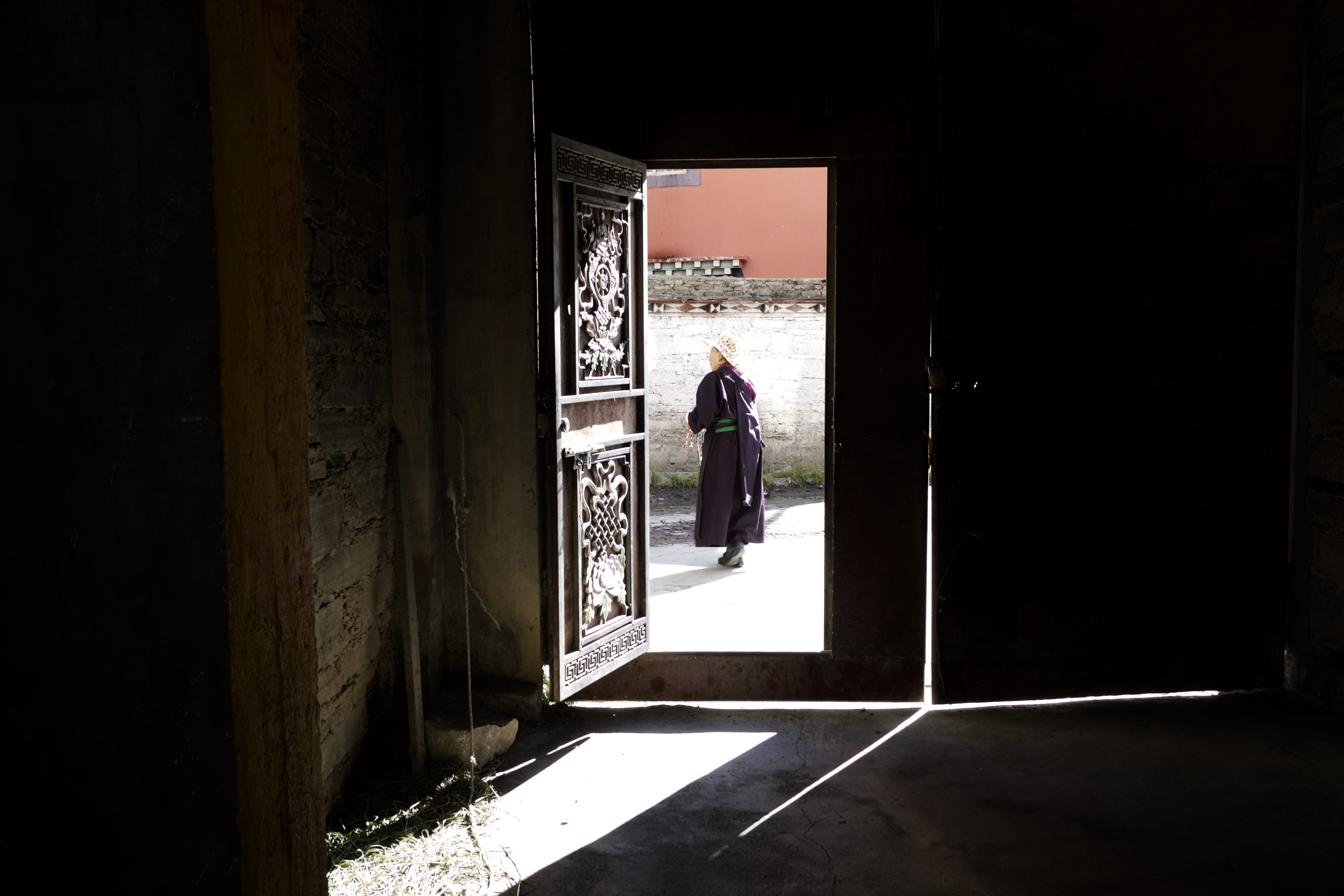 4K, sunlight, built structure, light through doorway, architecture, garze, lifestyles, door, adult, real people, one person, standing, doorway, china, HD Wallpaper