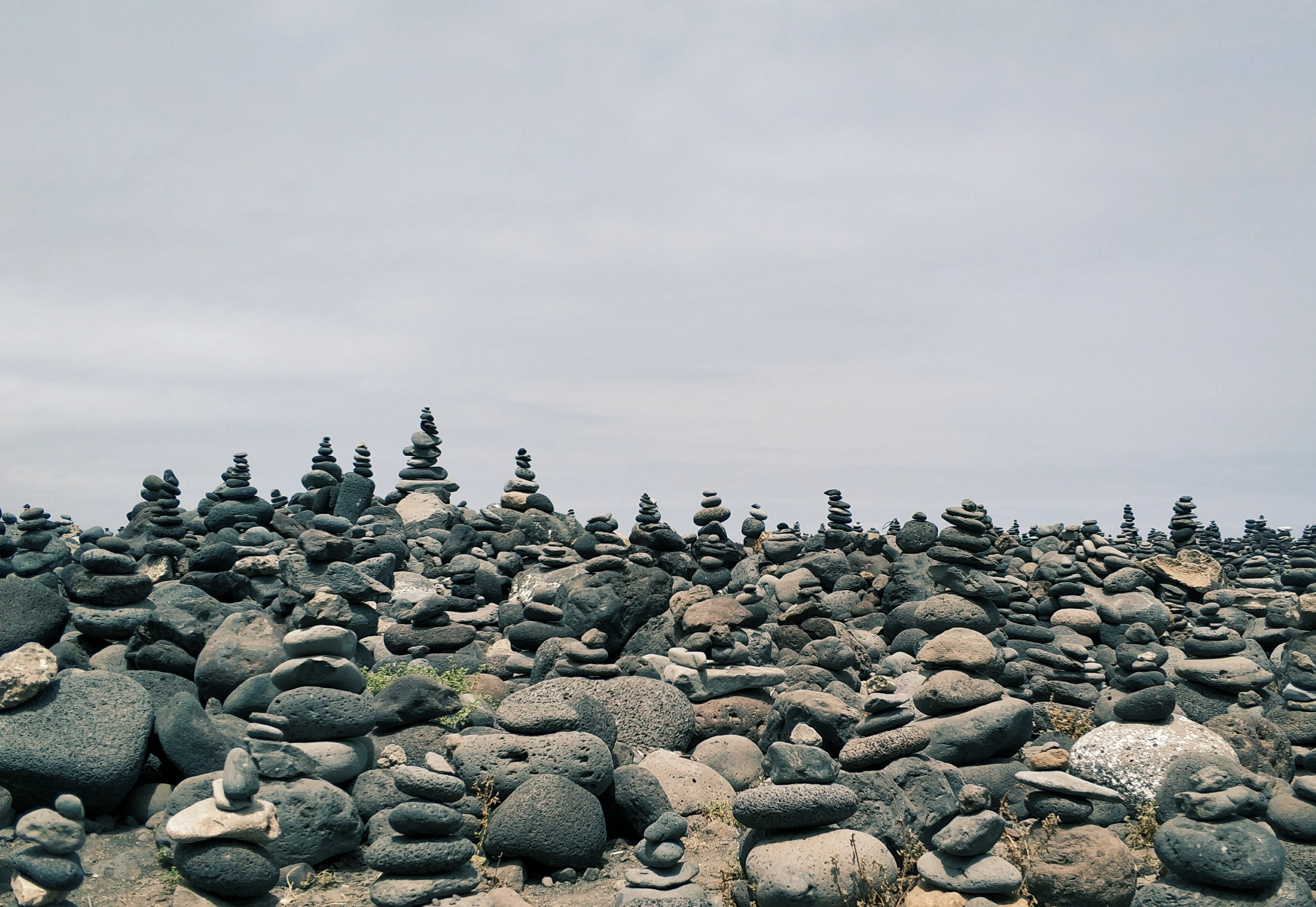 stones, no people, sky, beach, 2K, water, day, land, stone - object, solid, outdoors, tenerife, balance, rock, beauty in nature, stack, pebble, historical, HD Wallpaper