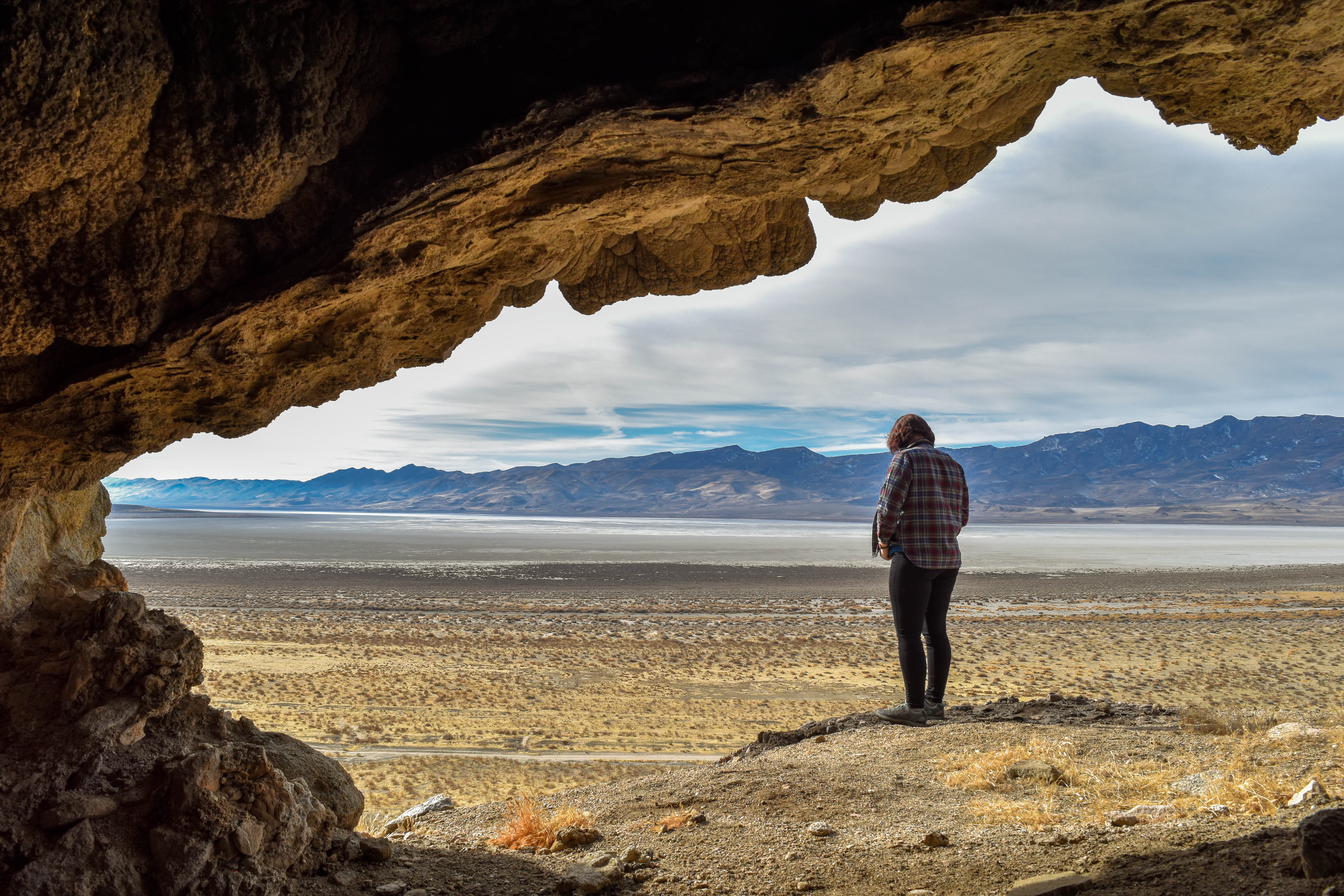 full length, solid, standing, non-urban scene, leisure activity, mountain, nevada, rock, casual clothing, mountain range, cave, tranquil scene, united states, HD Wallpaper
