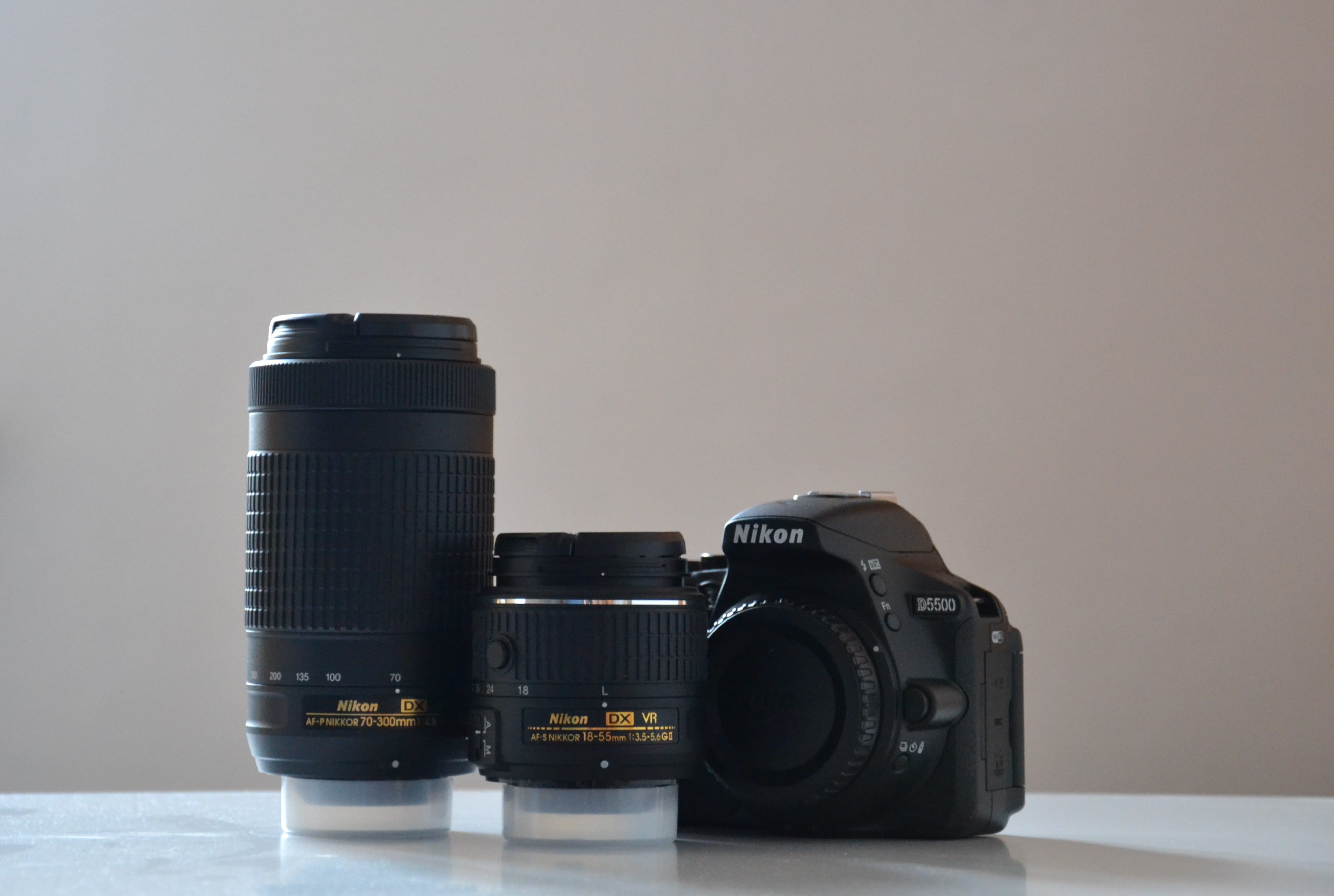 photographic equipment, lens - eye, camera, black, white background, close-up, studio shot, still life, photography themes, d5500, table, modern, nikon, HD Wallpaper