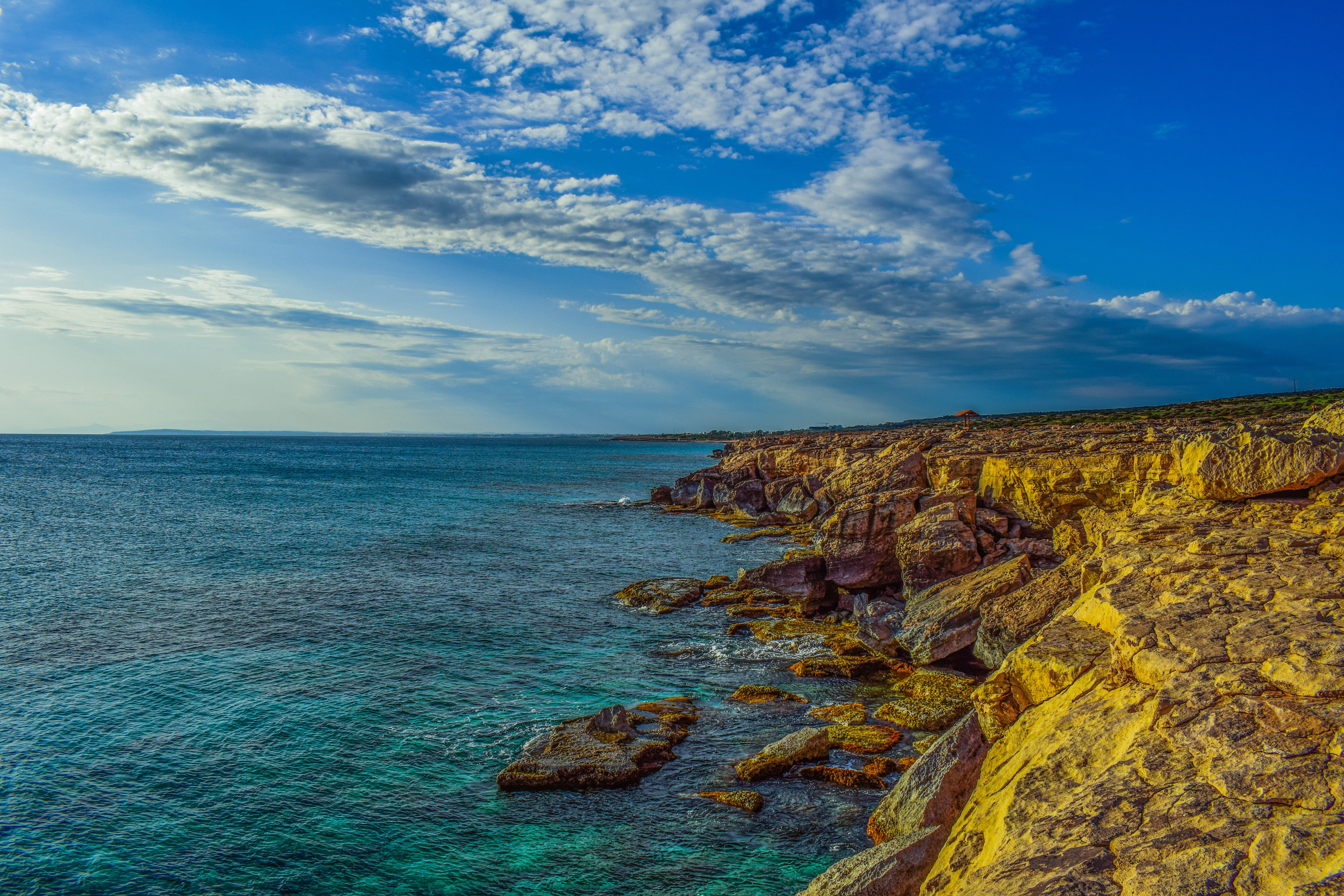 scenics, rock formation, tranquil scene, blue, national park, land, cliff, clouds, beach, eroded, outdoors, shore, cloud - sky, erosion, cavo greko, horizon over water, HD Wallpaper