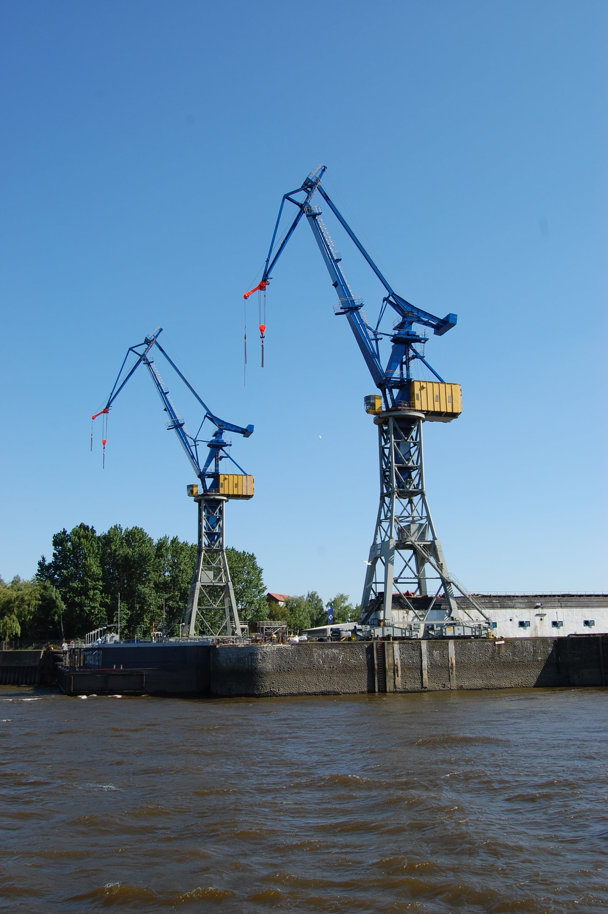 development, construction equipment, blue, cranes, port, renewable energy, construction Industry, architecture, day, built structure, river, fuel and power generation, Phone HD Wallpaper