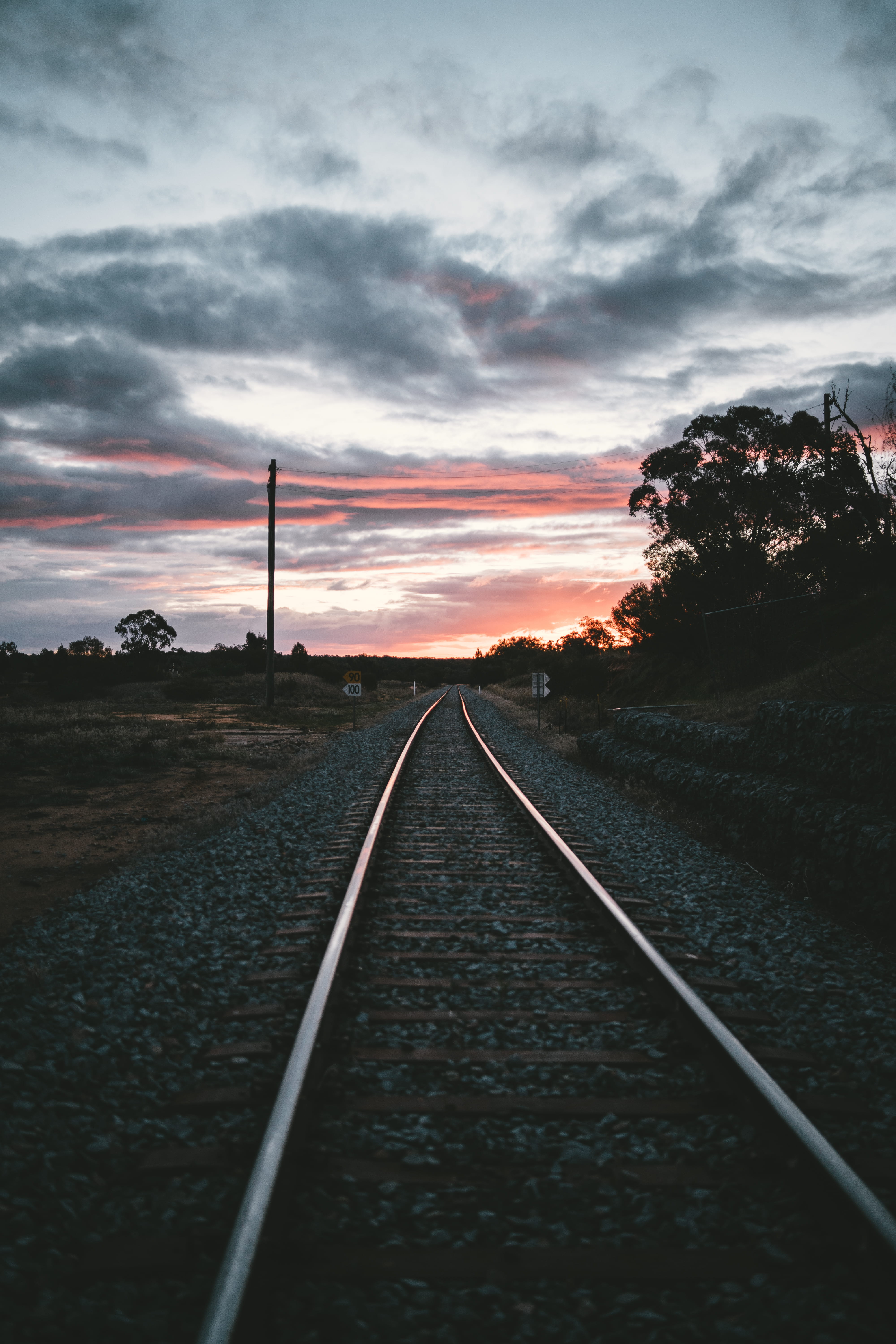 silhouette, outdoors, direction, red sky, dusk, straight, narrandera, transport, transportation, no people, train, rail, environment, diminishing perspective, Phone HD Wallpaper
