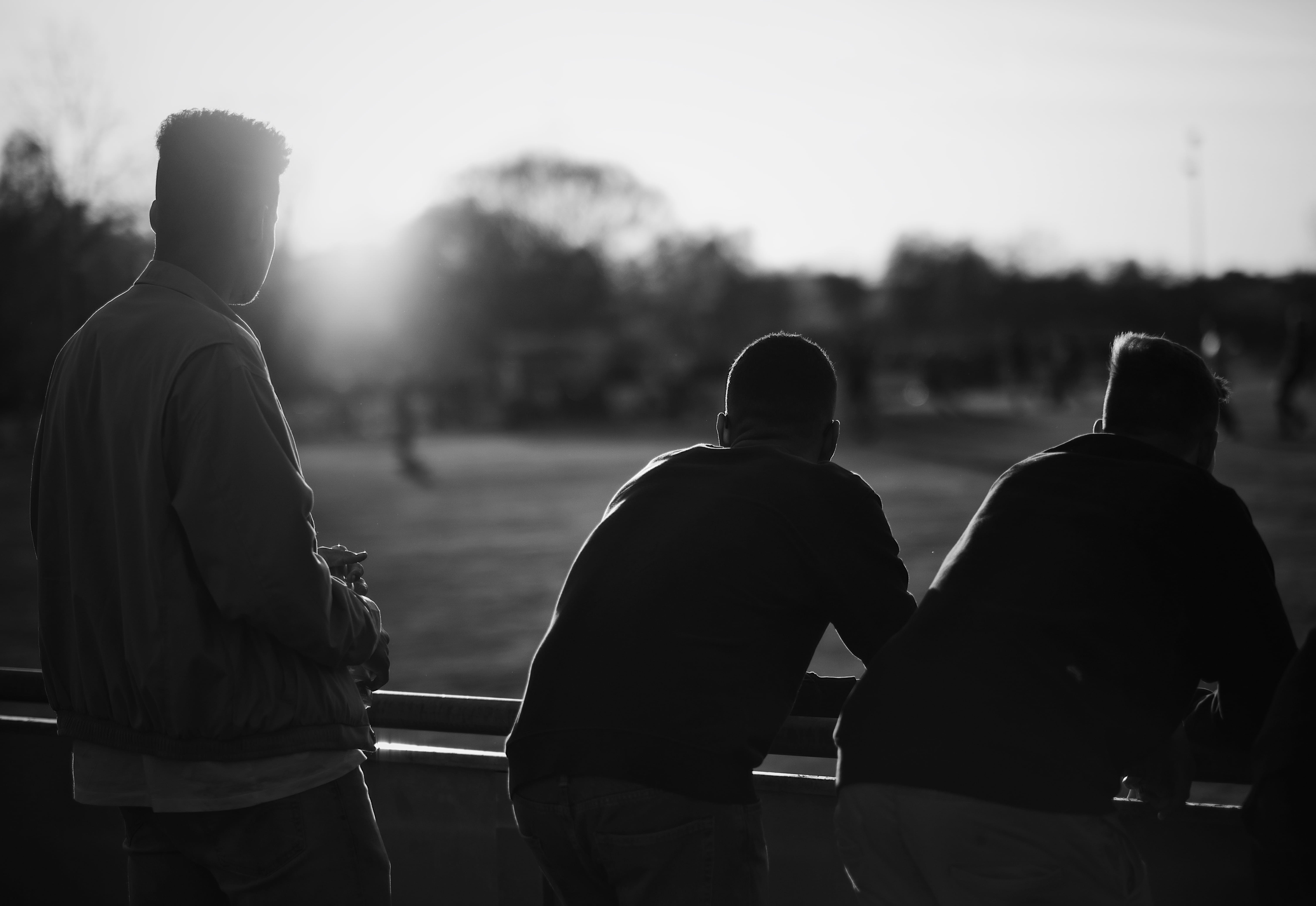 men, real people, medium group of people, coat, 5K, finger, standing, light, shorts, asphalt, apparel, grayscale, handrail, nature, railing, person, hand, HD Wallpaper