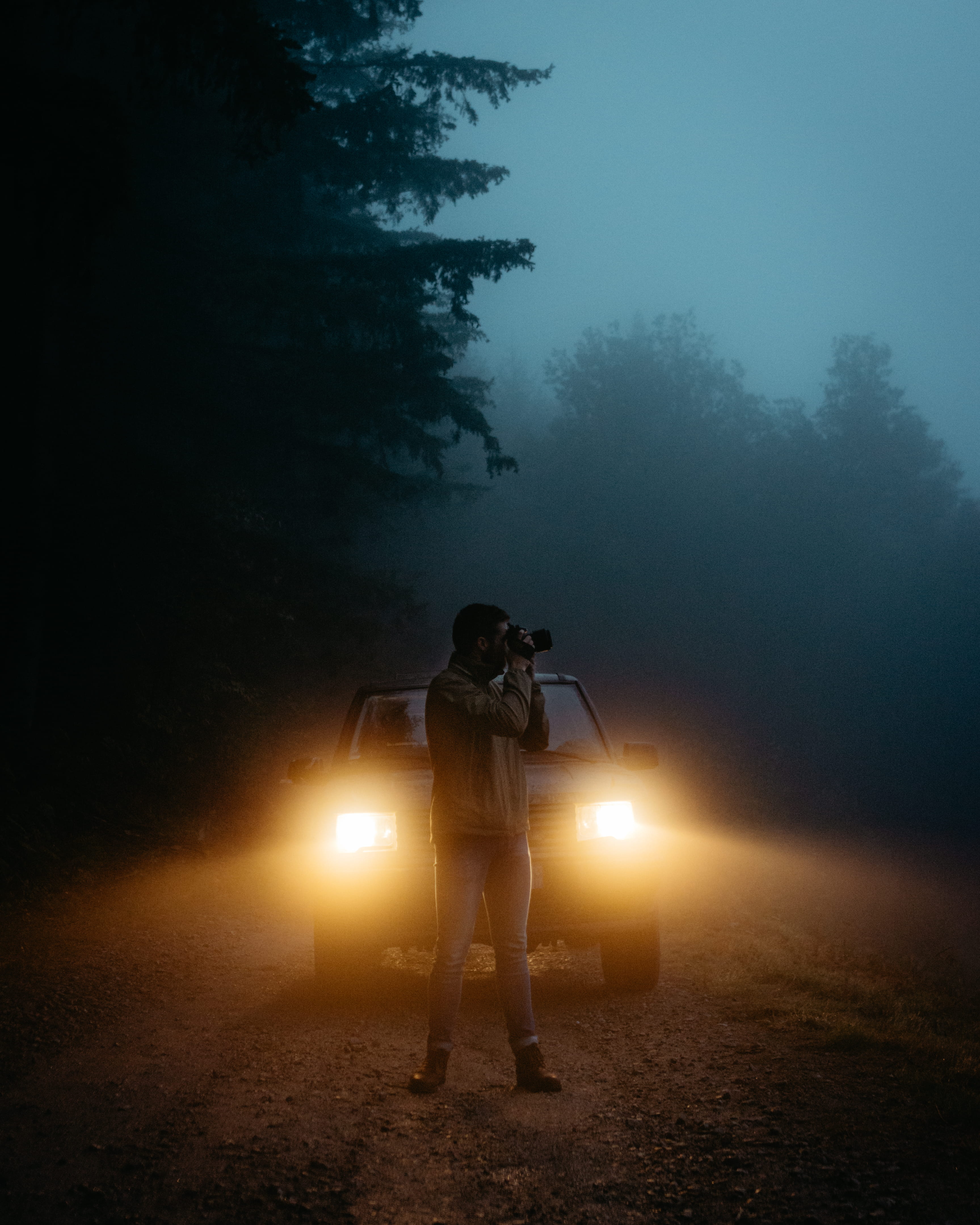 guy, land, nature, leisure activity, real people, person, mist, headlamps, trees, foggy, modern, headlight, tree, headlights, dirt road, male, taking photo, Phone HD Wallpaper