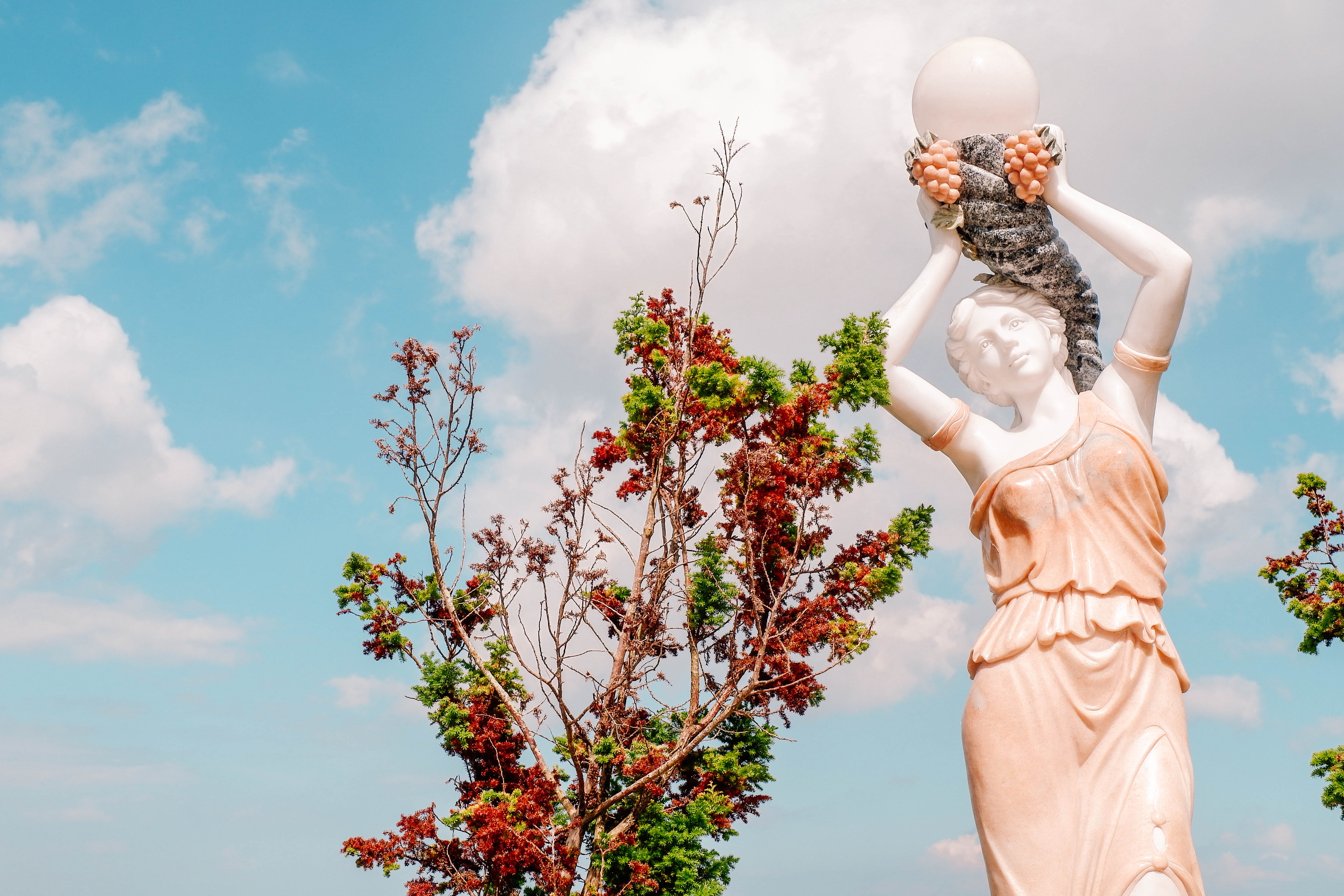 Cebu, no people, tree, male likeness, religion, temple of leah, statue, belief, outdoors, low angle view, female likeness, woman, day, creativity, cloud - sky, HD Wallpaper