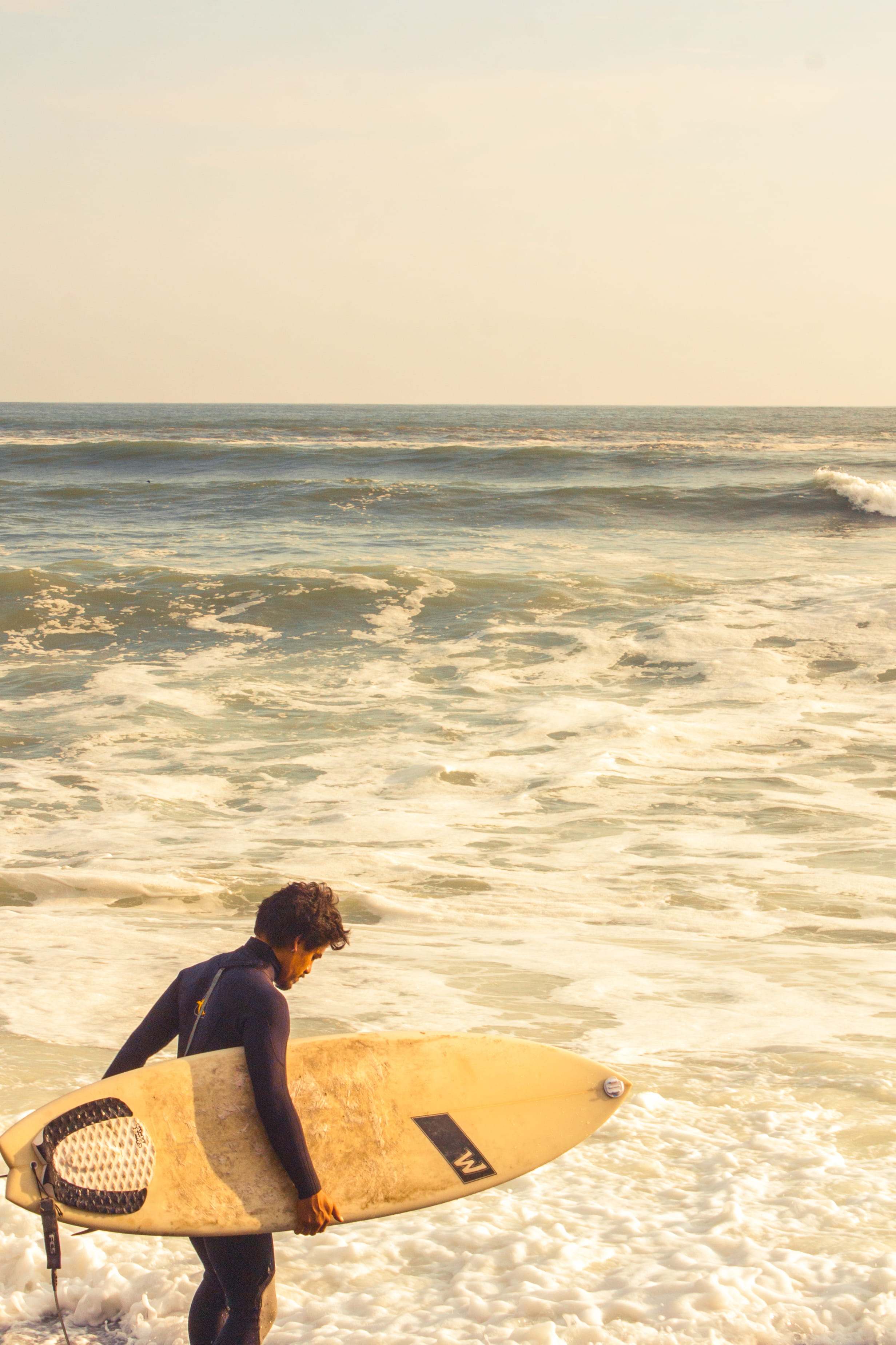 horizon, ocean, sea, sports equipment, shoreline, land, water sport, leisure activity, surfboard, nature, seascape, 2K, sunset, motion, man, carrying, Phone HD Wallpaper