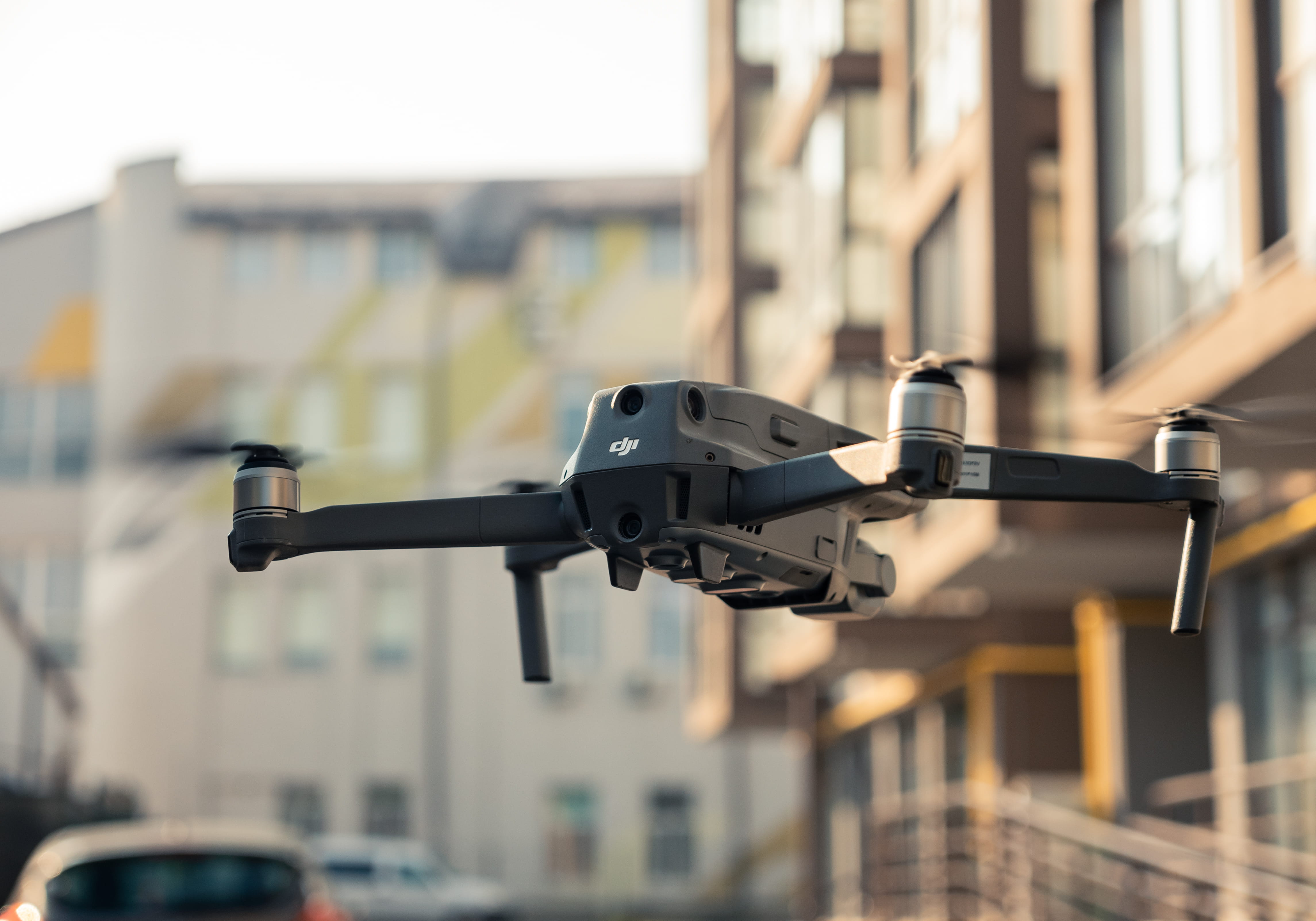 gadget, transportation, no people, close-up, city, building exterior, architecture, view, land vehicle, drone, selective focus, outdoors, equipment, handle, HD Wallpaper