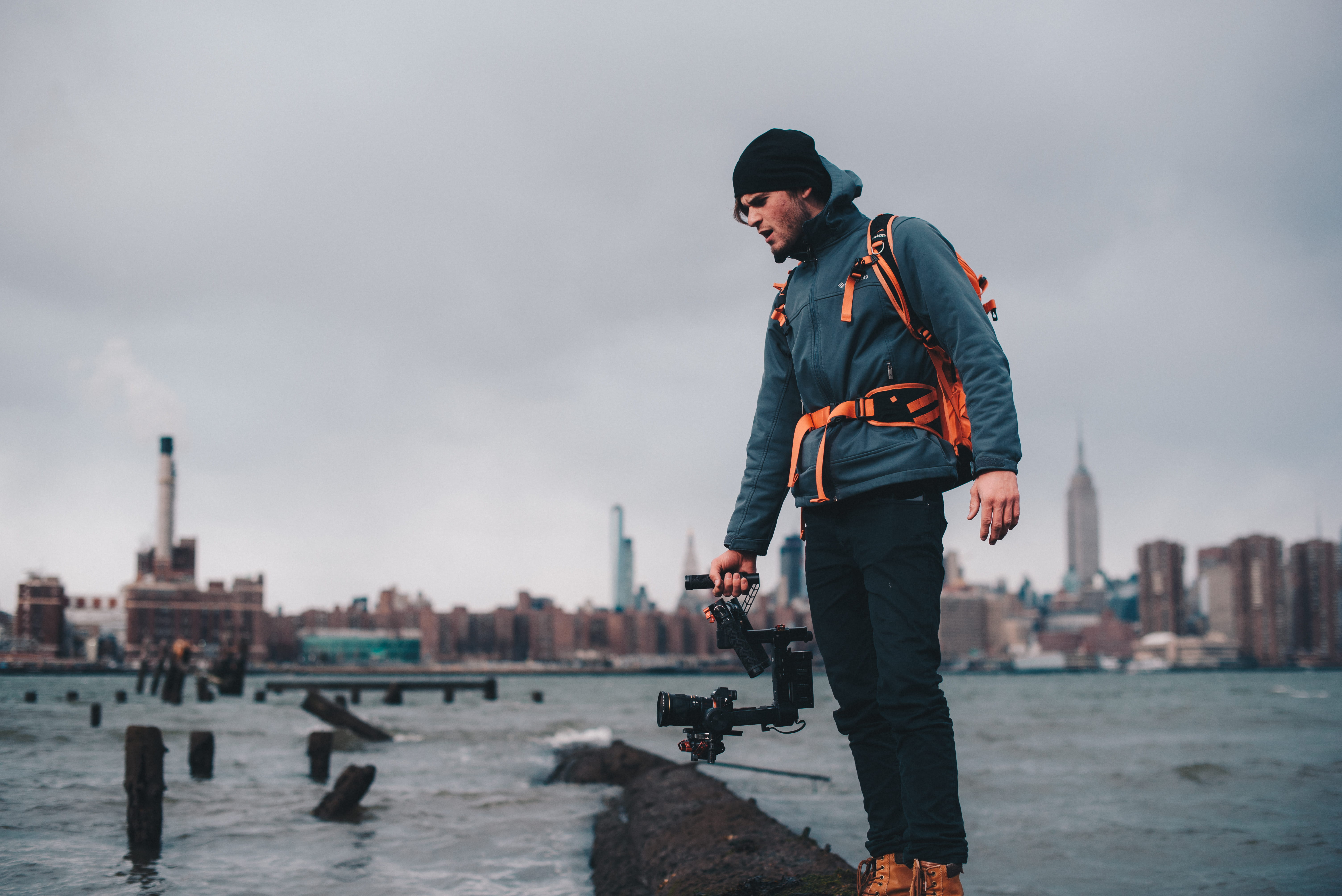 built structure, city, one person, full length, capturing, male, young men, daytime, ocean, jacket, lifestyles, leisure activity, clothing, nature, photo, HD Wallpaper