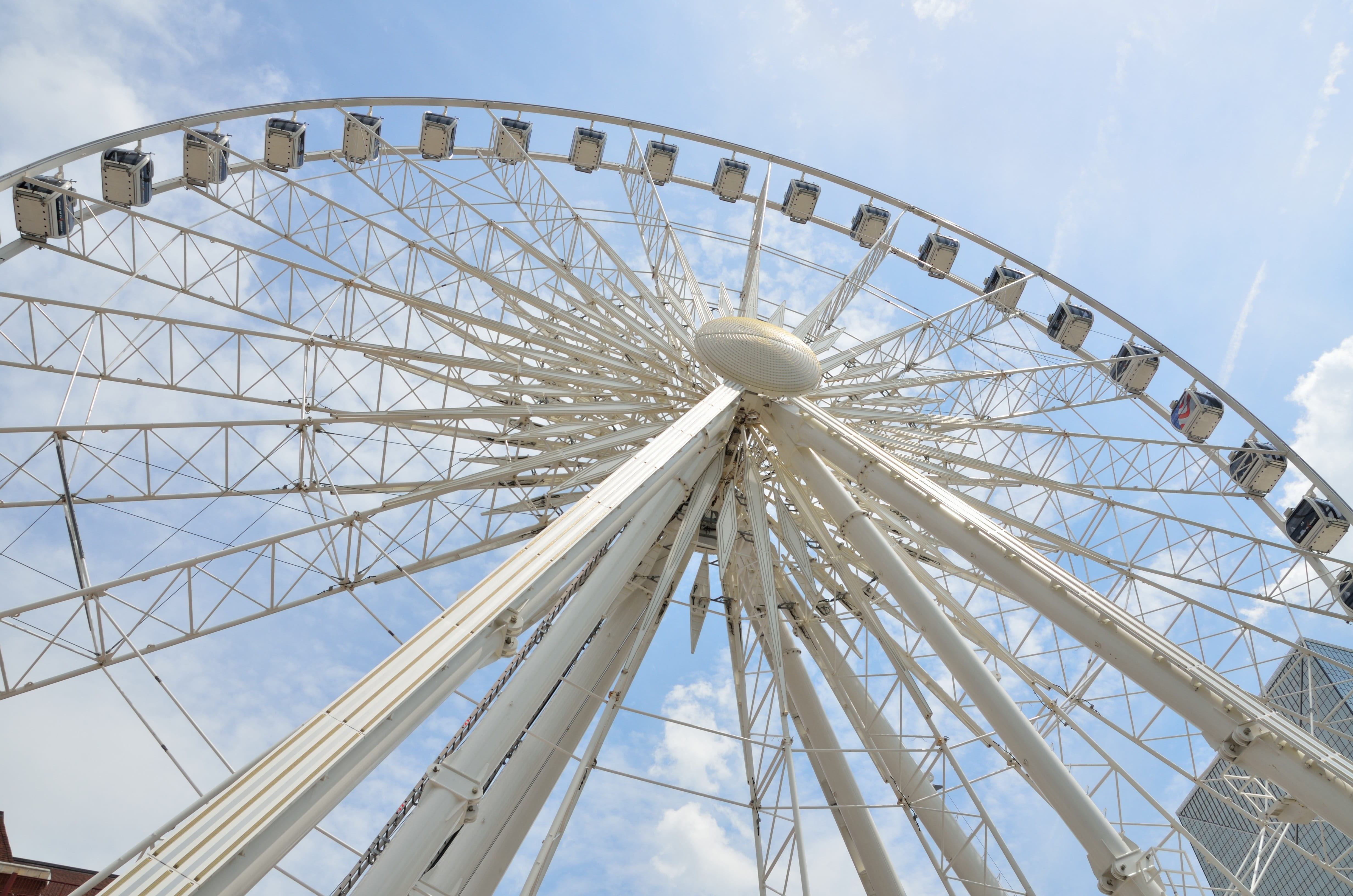 amusement park, skyview, cloud - sky, landmark, low angle view, city, wheel, park, fun, carnival - celebration event, blue, cityscape, people, angle, no people, HD Wallpaper