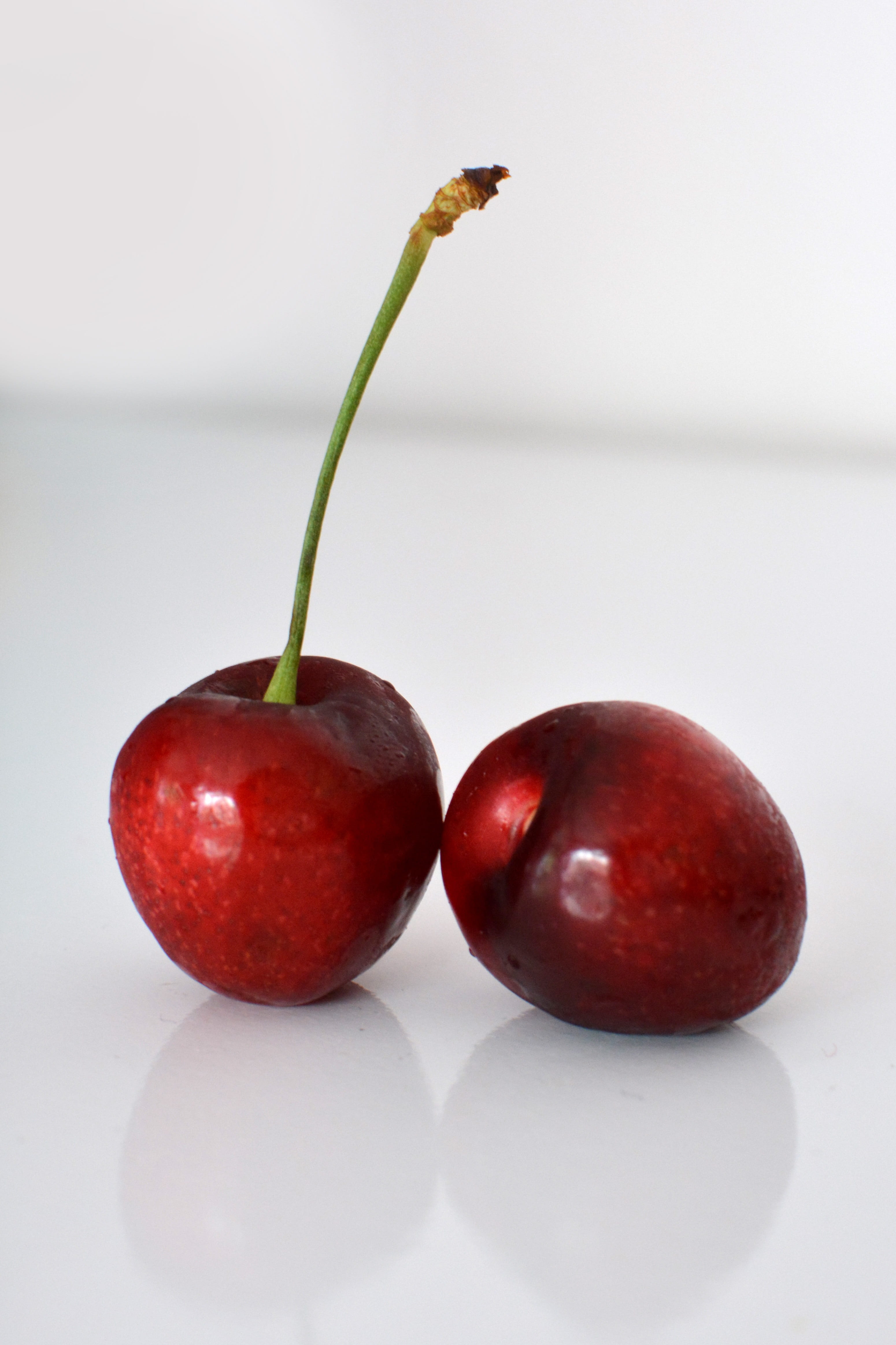 red, juicy, fruit, plant, healthy eating, freshness, dessert, food, brilliant, ripe, tasty, white background, nature, no people, indoors, luscious, temptation, Phone HD Wallpaper