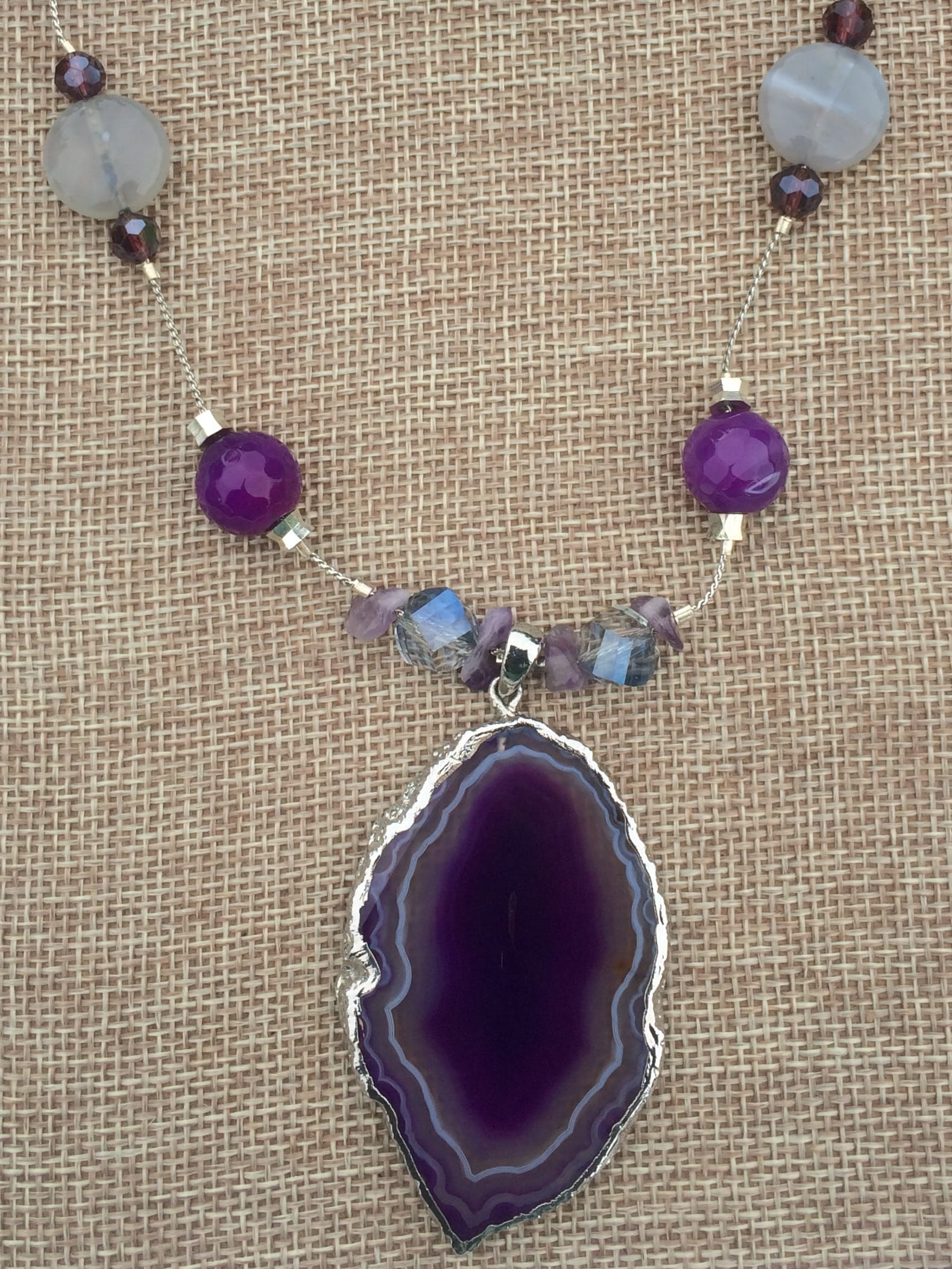 pattern, art and craft, high angle view, floral pattern, table, design, necklace, 1080P, purple, bead, silver, fashion, gemstone, handmade, close-up, carpet - decor, Phone HD Wallpaper