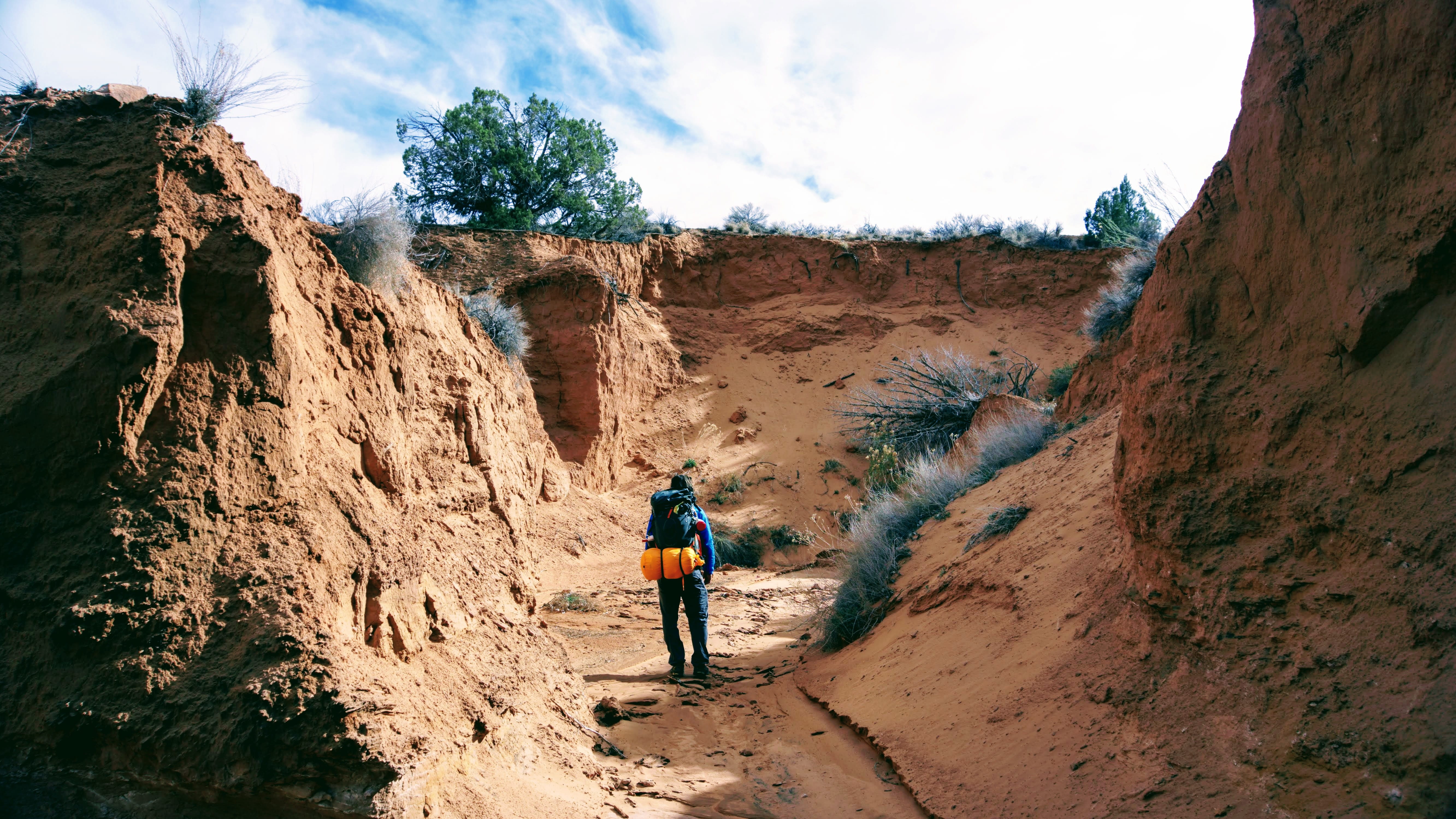 activity, canyon, sand, backpacker, hiker, beauty in nature, 5K, rock, riverbed, sky, day, rear view, travel, adventure, nature, people, outdoors, mountain, HD Wallpaper