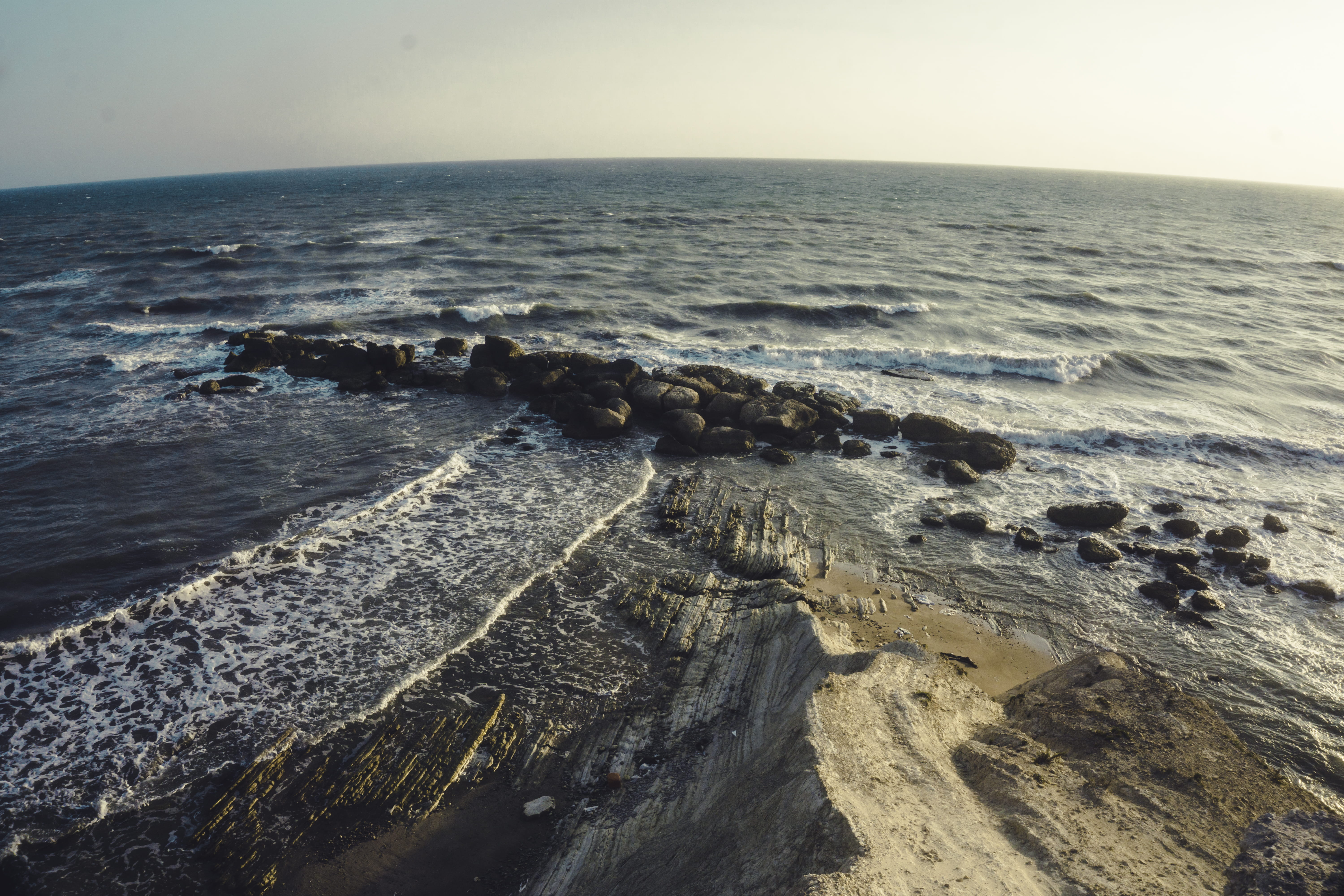 water, motion, surf, ocean, seascape, nature, beach, tranquil scene, non-urban scene, sky, clear sky, adana, rocky coastline, headland, shore, horizon over water, HD Wallpaper