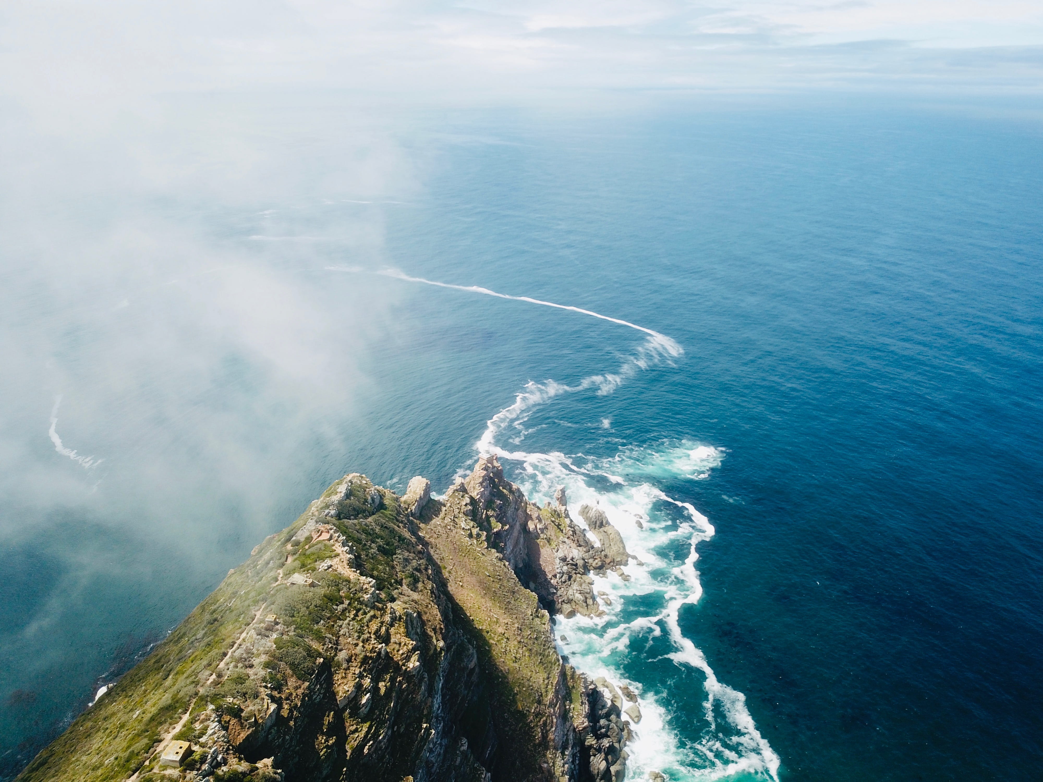high angle view, formation, cliff, unnamed road, ocean, no people, mountain, rock, nature, aerial, cloud - sky, beauty in nature, rock formation, coast, HD Wallpaper