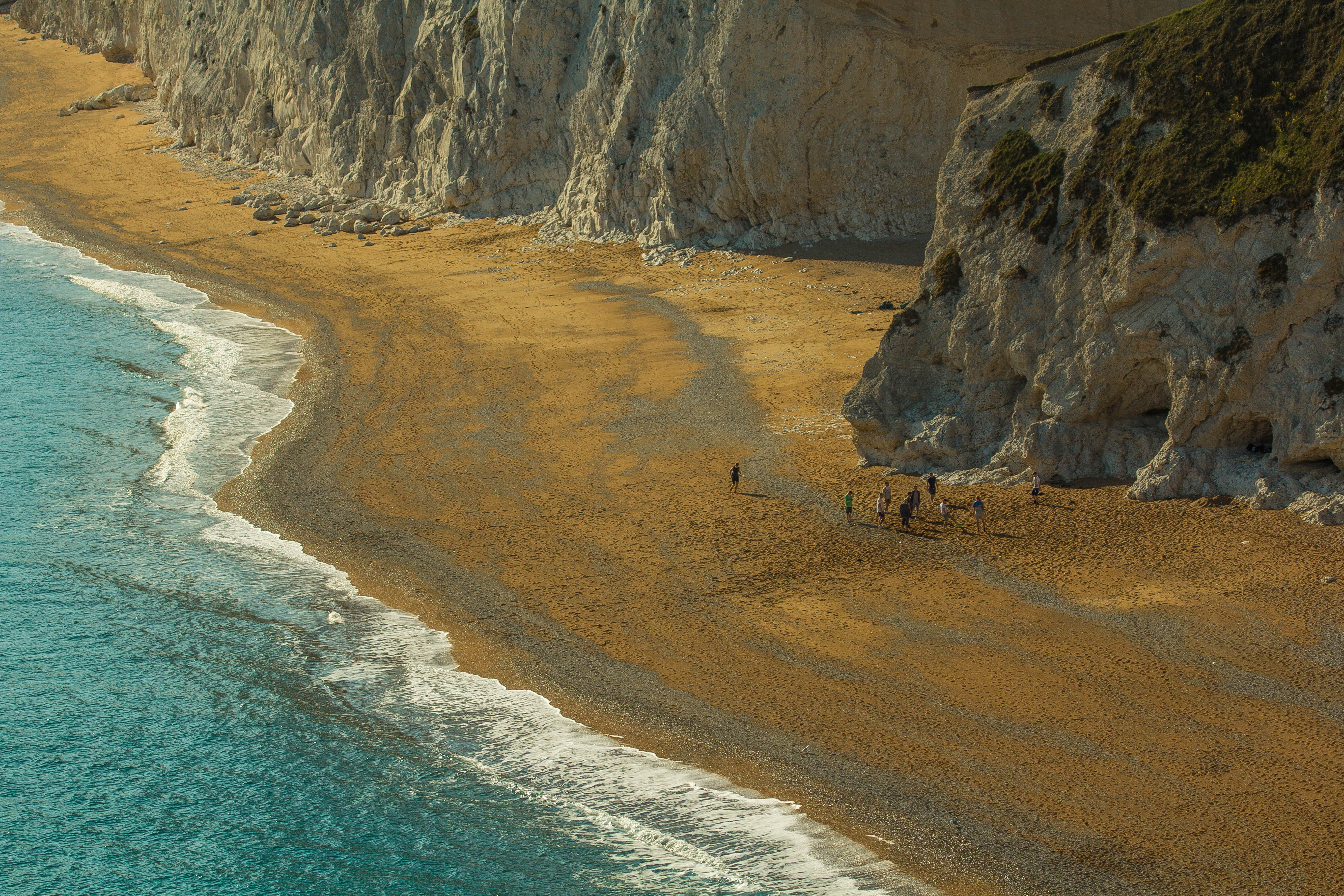 animal, beauty in nature, geology, hill, tranquil scene, rock, sea, cave, the ocean, boulder, beach, durdle door, tranquility, nature, wareham, solid, eroded, HD Wallpaper