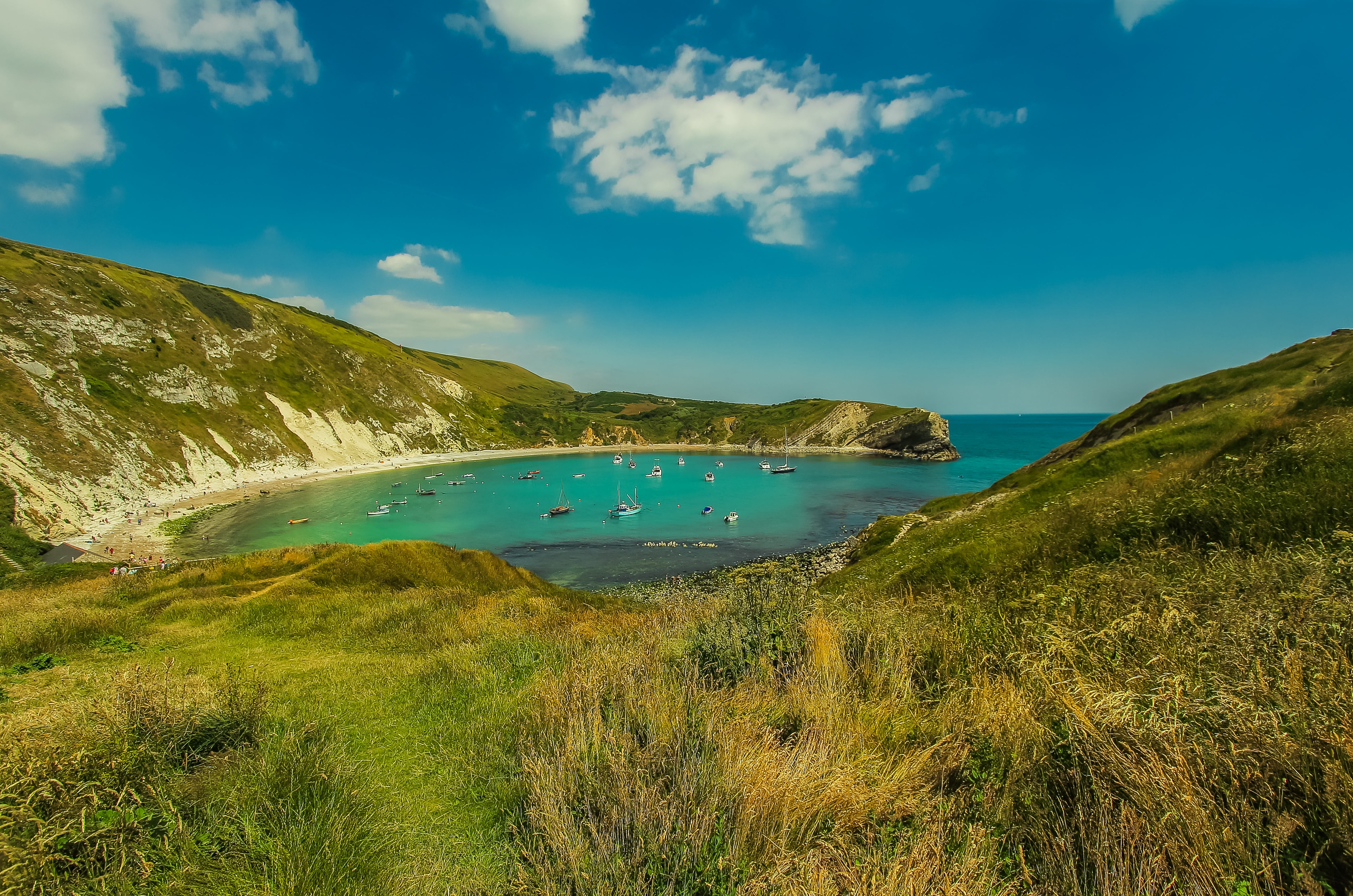 nature, lulworth cove, grass, beach, water, idyllic, non-urban scene, no people, 5K, mountain, outdoors, laguna, cloud - sky, ocean, tranquil scene, dorset, HD Wallpaper