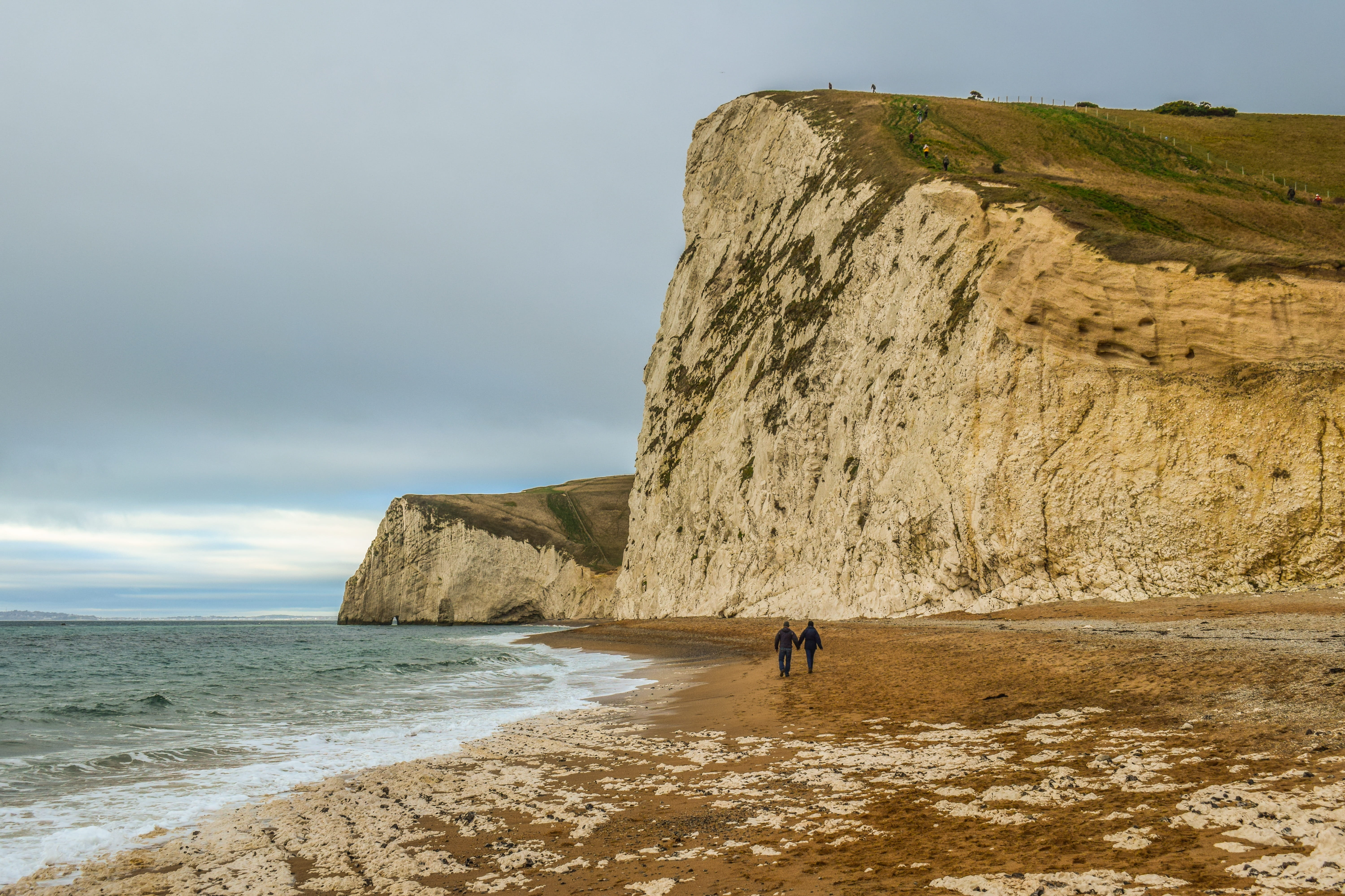 jurassic coast, leisure activity, dorset, solid, rock, coastline, nature, sky, men, people, horizon, landscape, sea, england, water, ocean, 5K, outdoors, HD Wallpaper