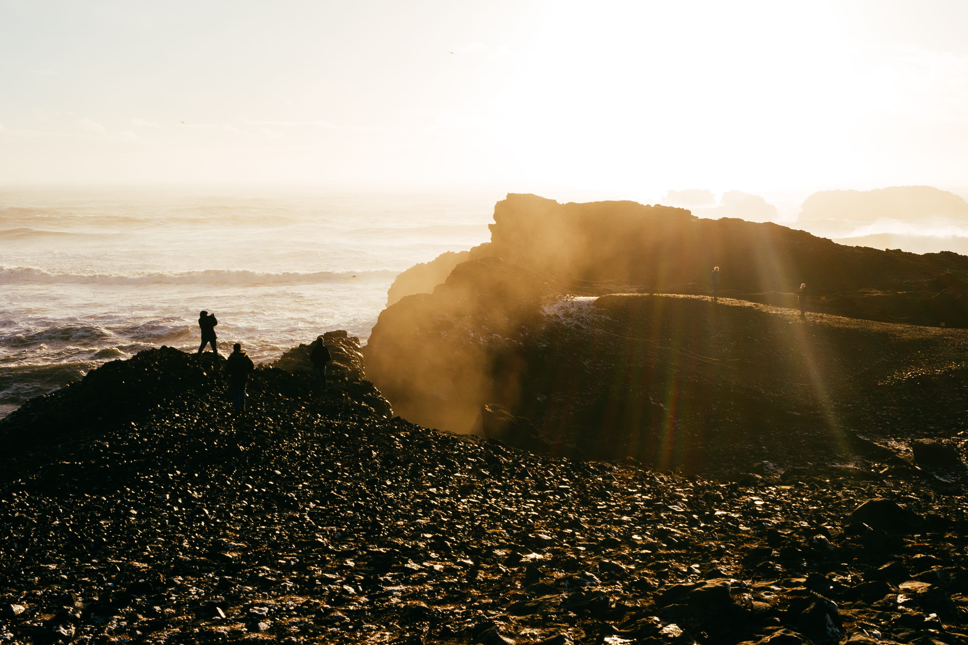 nature, one person, lens flare, sunset, sky, vik, standing, lifestyles, rock, atlantic, land, outdoors, tranquil scene, scenics - nature, 2K, reynisfjara, HD Wallpaper