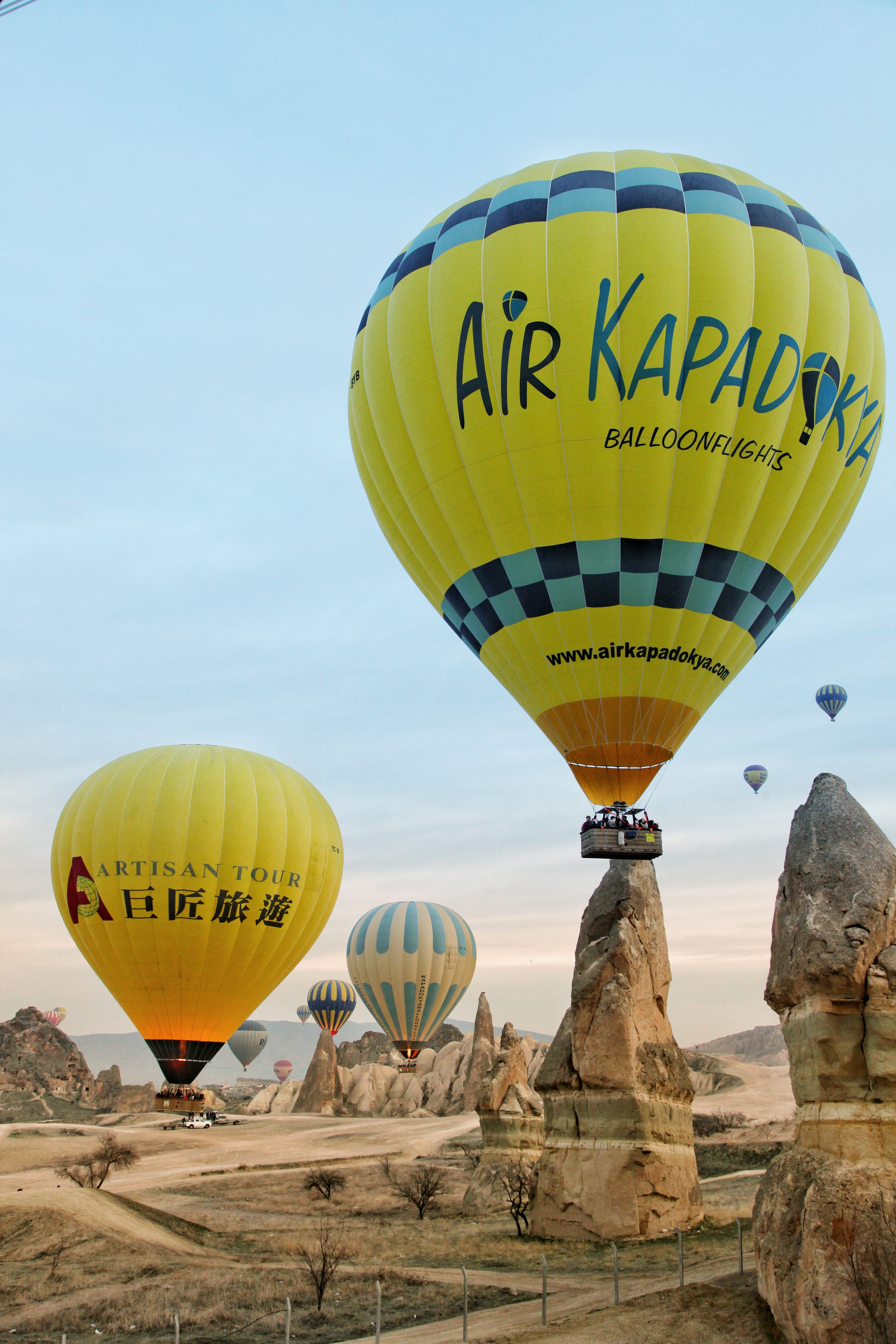clear sky, nature, sky, cappadocia, flying, travel, travel destinations, transportation, yellow, ballooning festival, adventure, mode of transportation, Phone HD Wallpaper