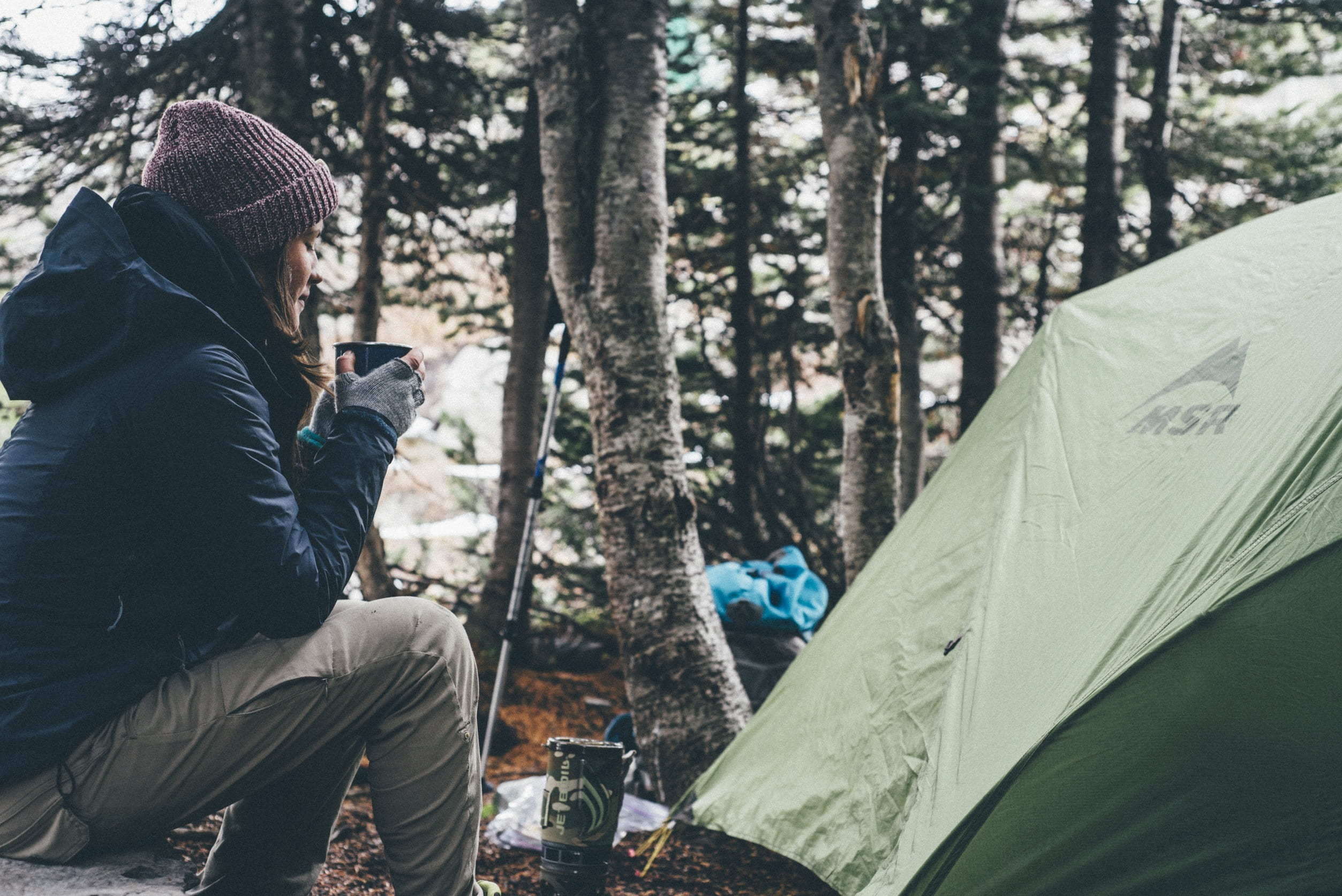 jacket, plant, woodland, real people, warm clothing, girl, day, tree, pants, winter, hat, beanie, holding, woman, land, tent, people, adult, cup, technology, HD Wallpaper