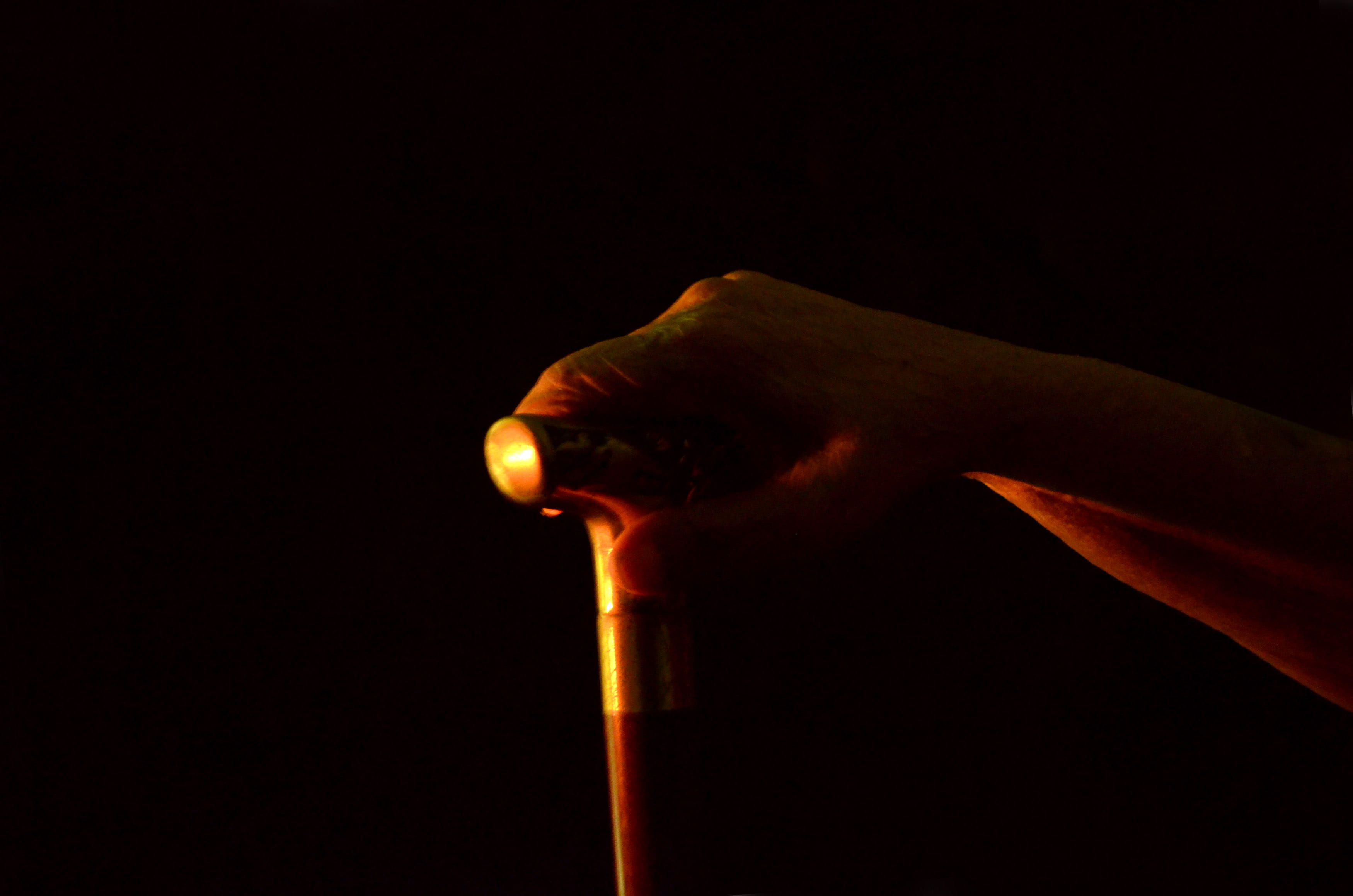 walking, heat - temperature, creative, studio shot, black background, mature adult, matchstick, life, holding, walking stick, ideas, indoors, hand, old age, HD Wallpaper