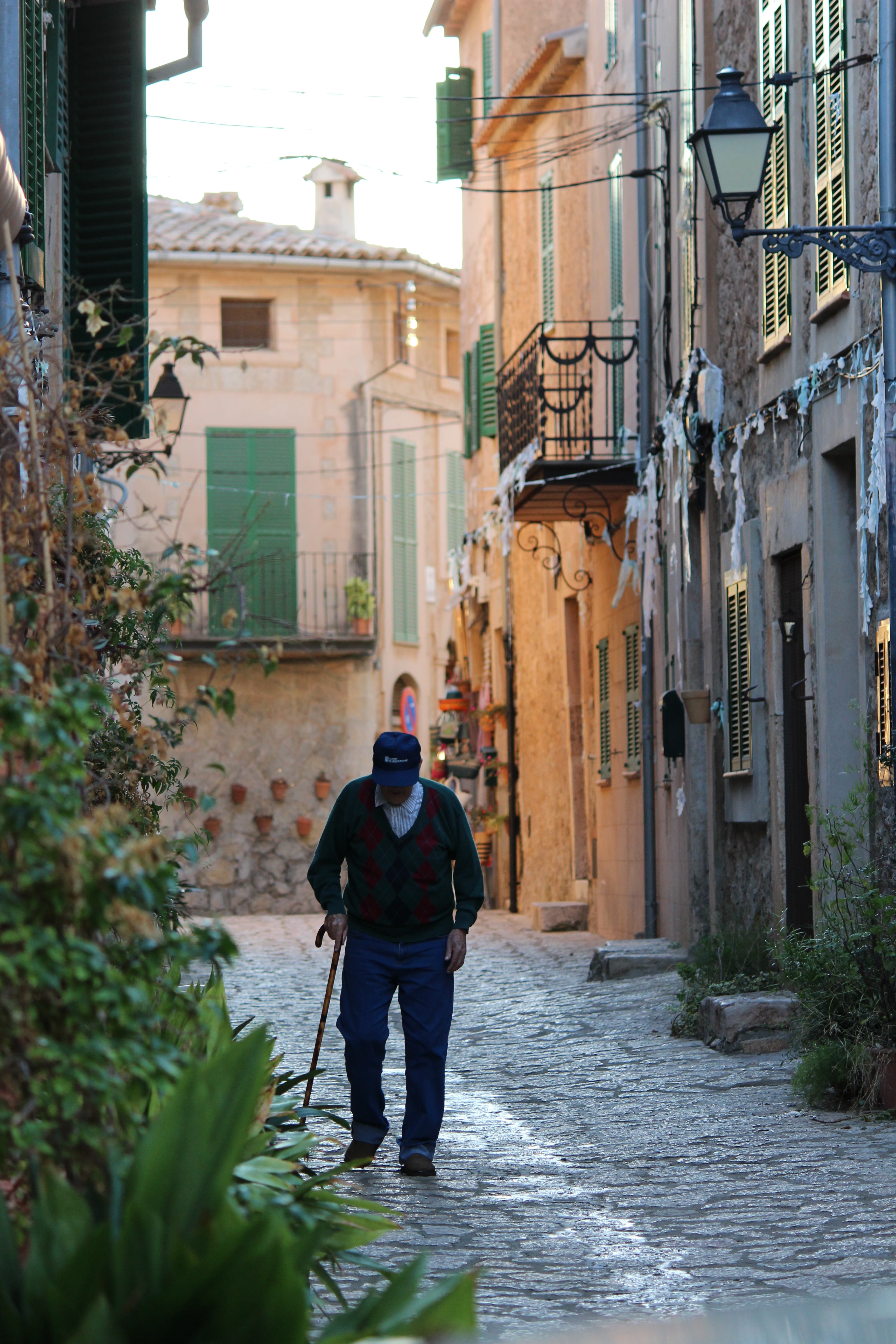 nature, old, one person, walking, old town, outdoors, pedestrian, leisure activity, full length, rear view, walking stick, man, day, building, street, mallorca, Phone HD Wallpaper