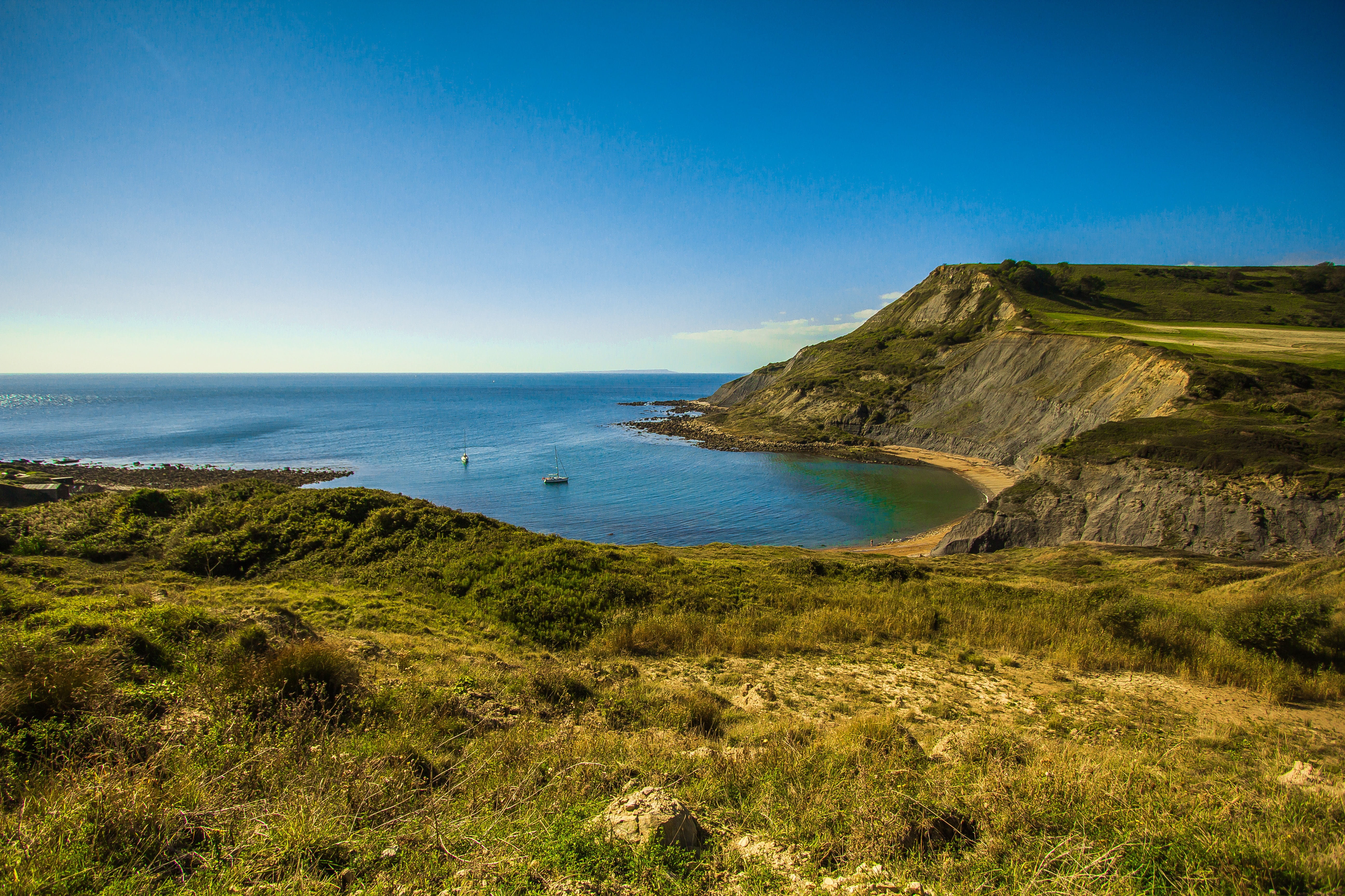 sky, cliff, photo, 5K, horizon, jurassic coast, horizon over water, tranquil scene, plant, clear sky, land, england, mountain, outdoors, ocean, nature, HD Wallpaper