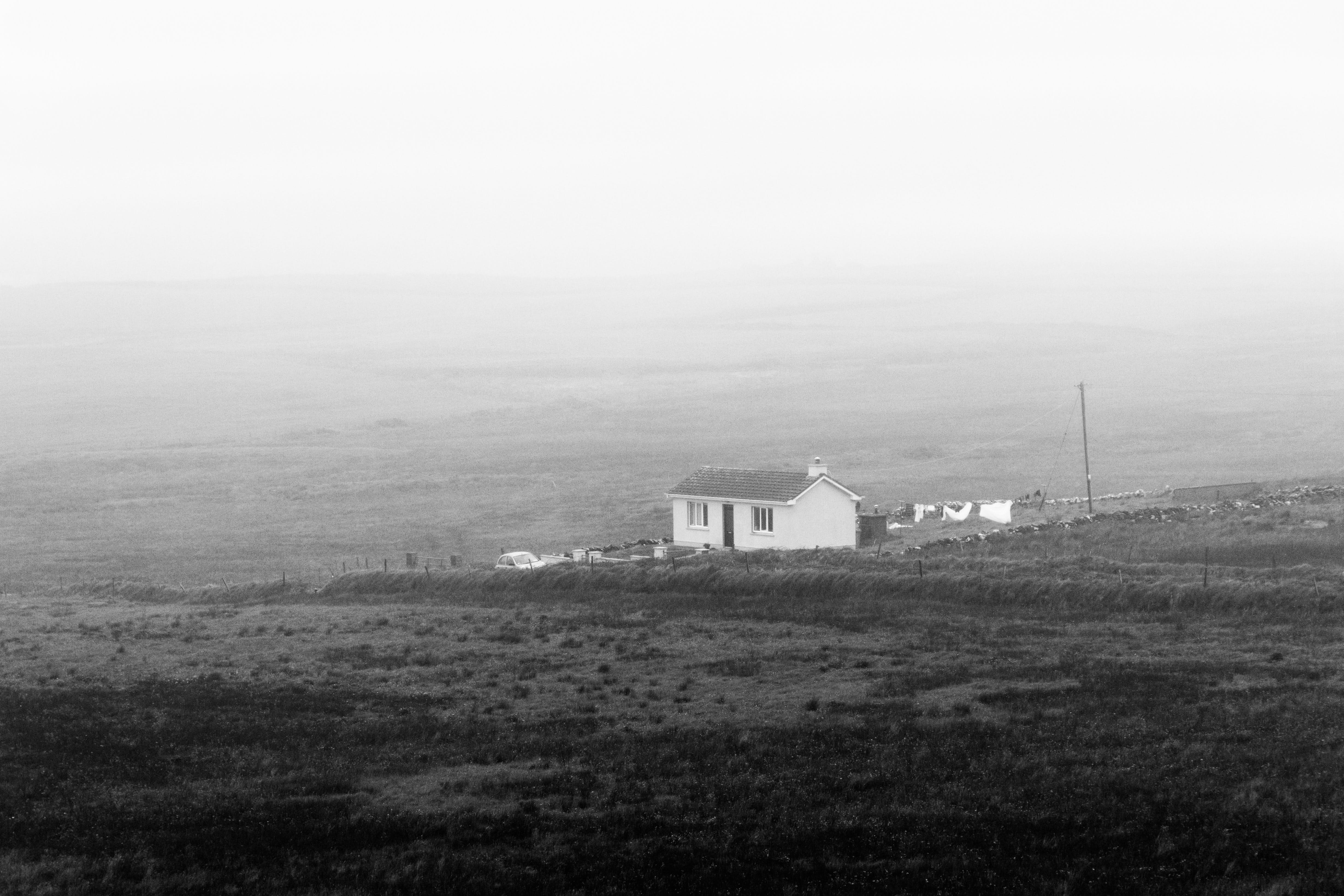 housing, grass, architecture, land, day, fog, travel, building exterior, building, plant, no people, sky, black and white, outdoors, 4K, agricultural building, HD Wallpaper