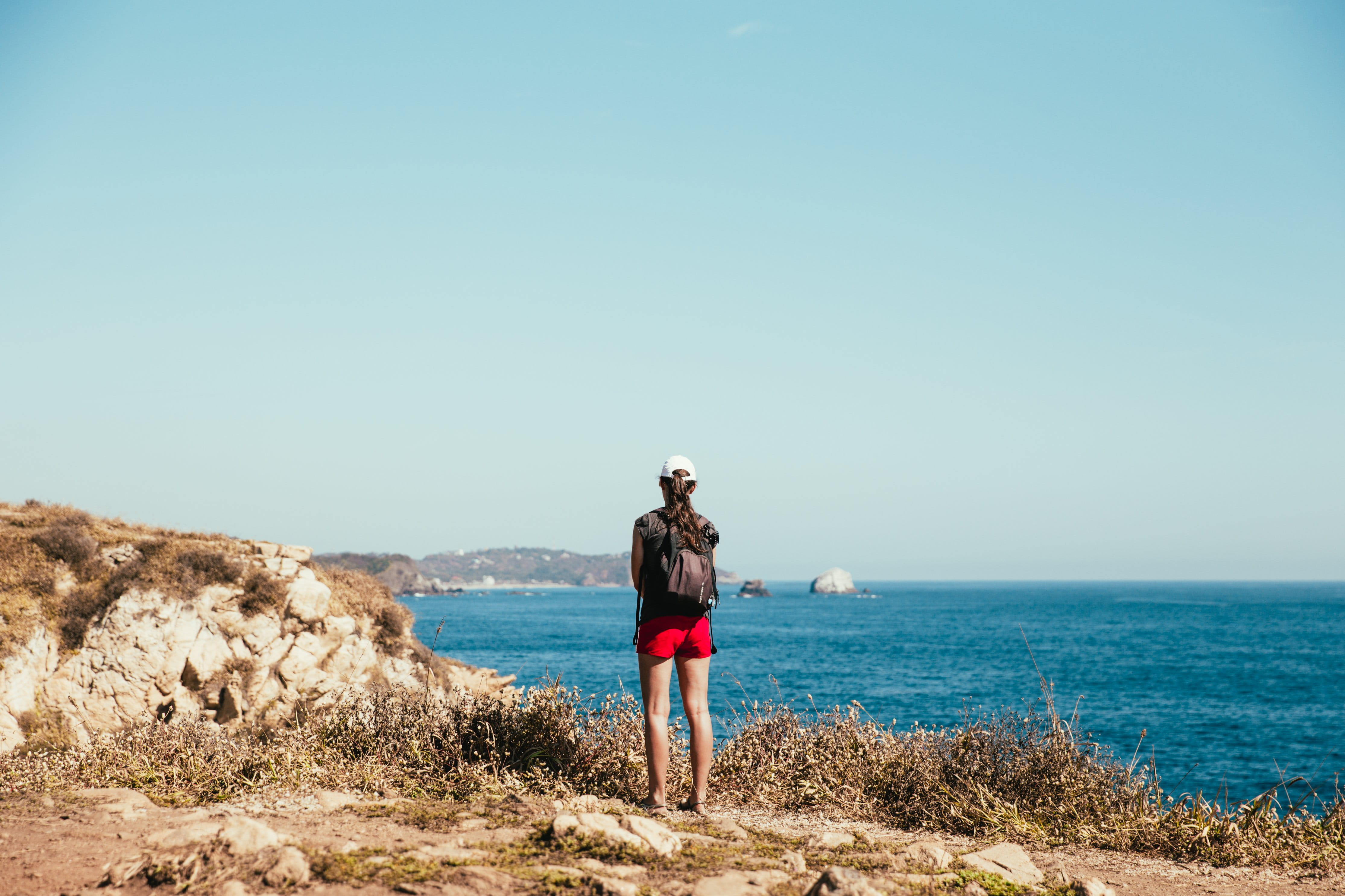 full length, standing, Water, young women, Sea, hiker, Sky, land, Earth, casual clothing, Travel, Women, horizon, one person, seaside, Ocean, leisure activity, HD Wallpaper