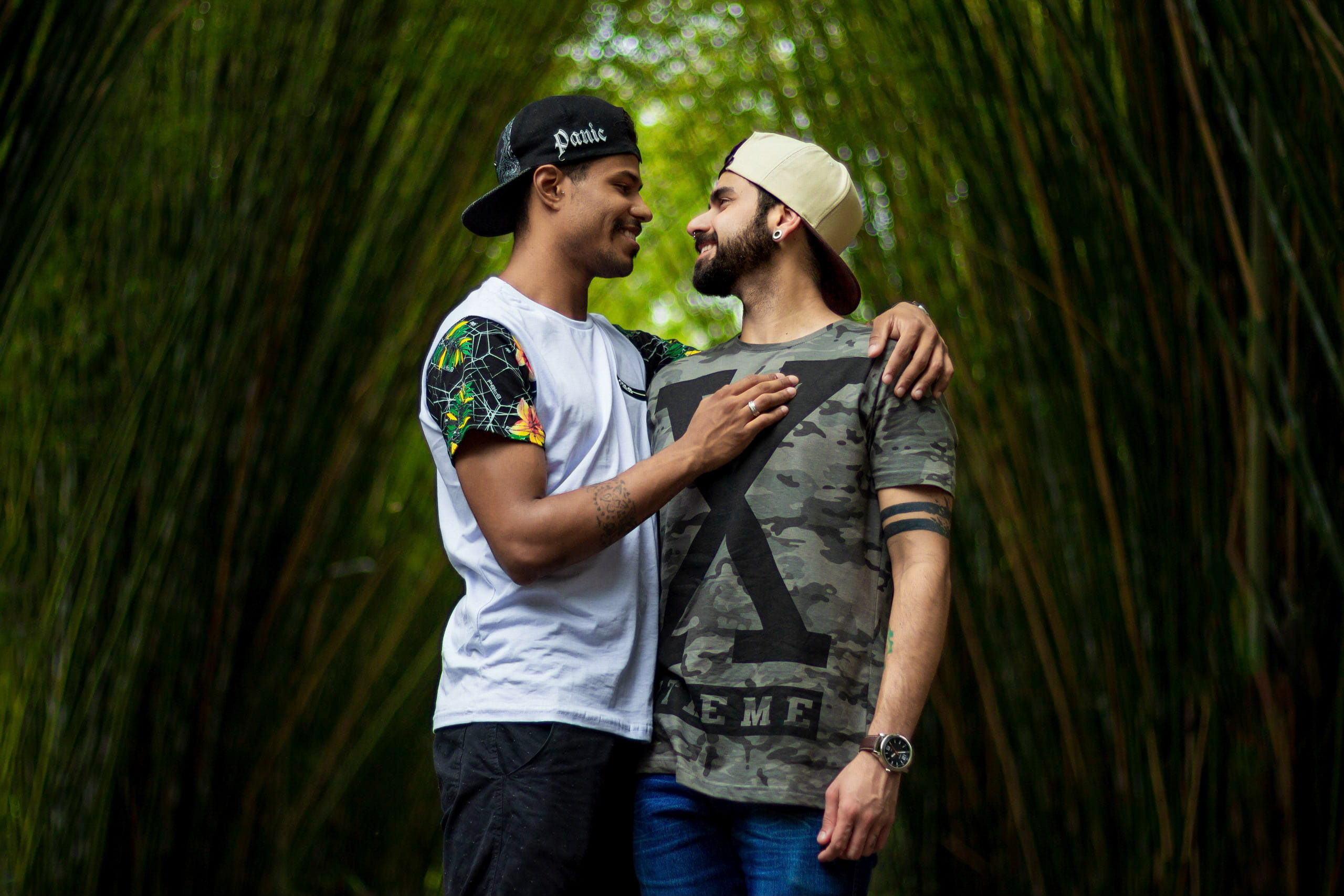 daylight, casual clothing, happiness, three quarter length, togetherness, summer, plant, young adult, couple, two people, park, adult, cap, enjoyment, together, HD Wallpaper