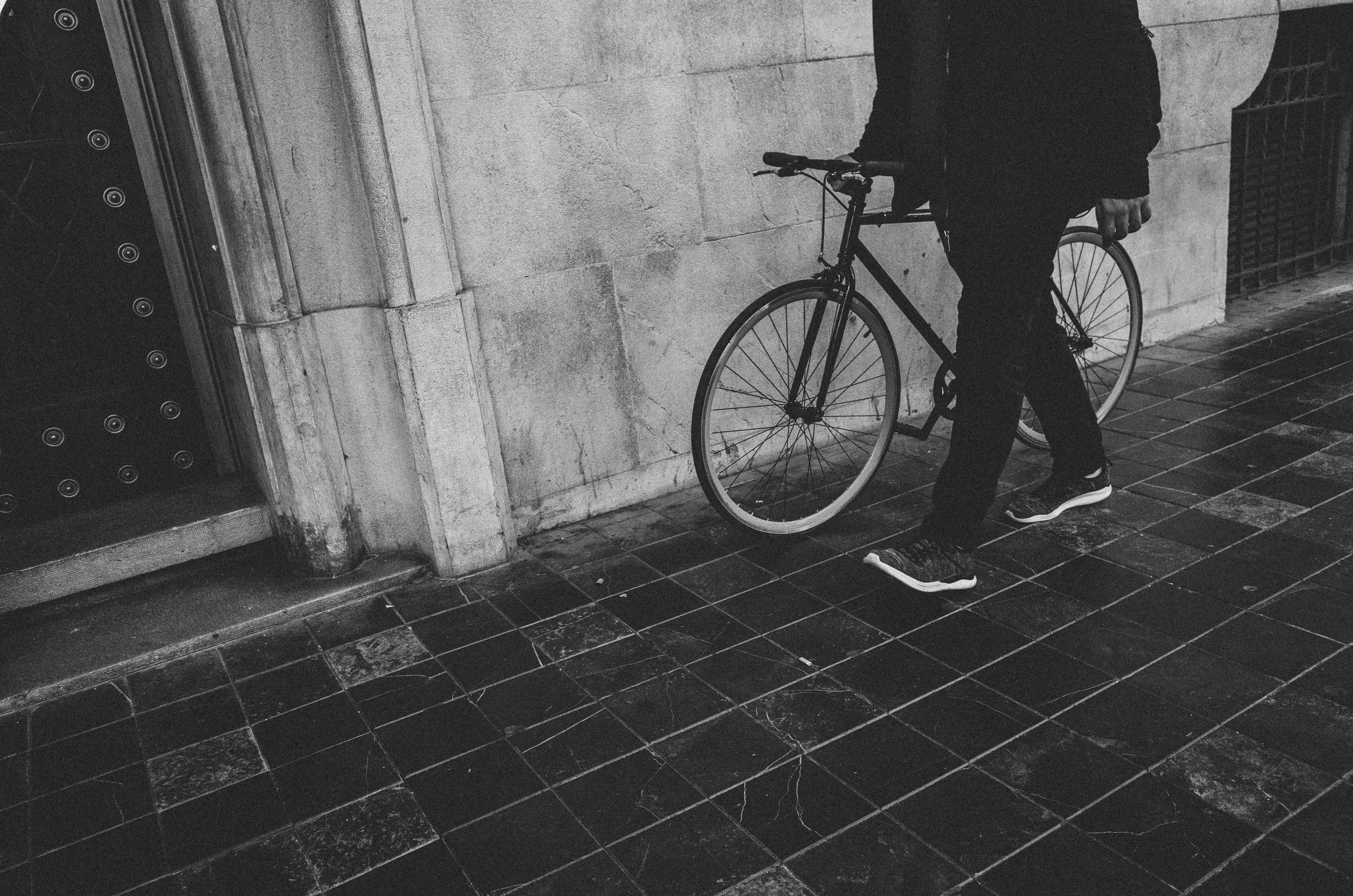 shoe, walking, apparel, path, one person, lifestyles, human, cyclist, real people, built structure, sidewalk, day, travel, clothing, footpath, greyscale, HD Wallpaper