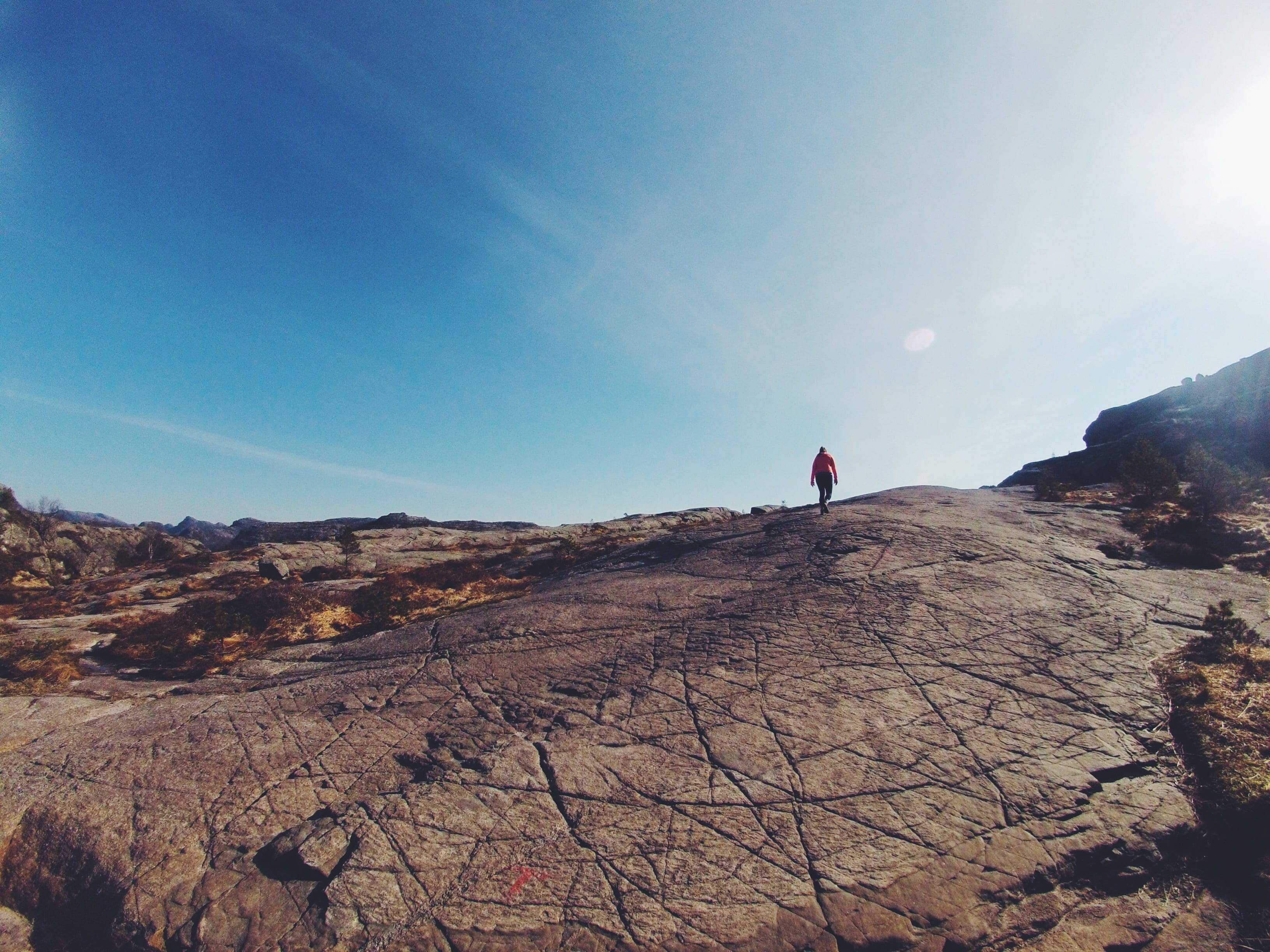 outdoors, hiker, non-urban scene, beauty in nature, nature, man, rock - object, 2K, afar, trip, brown, mountain, arid climate, day, scenics - nature, land, HD Wallpaper