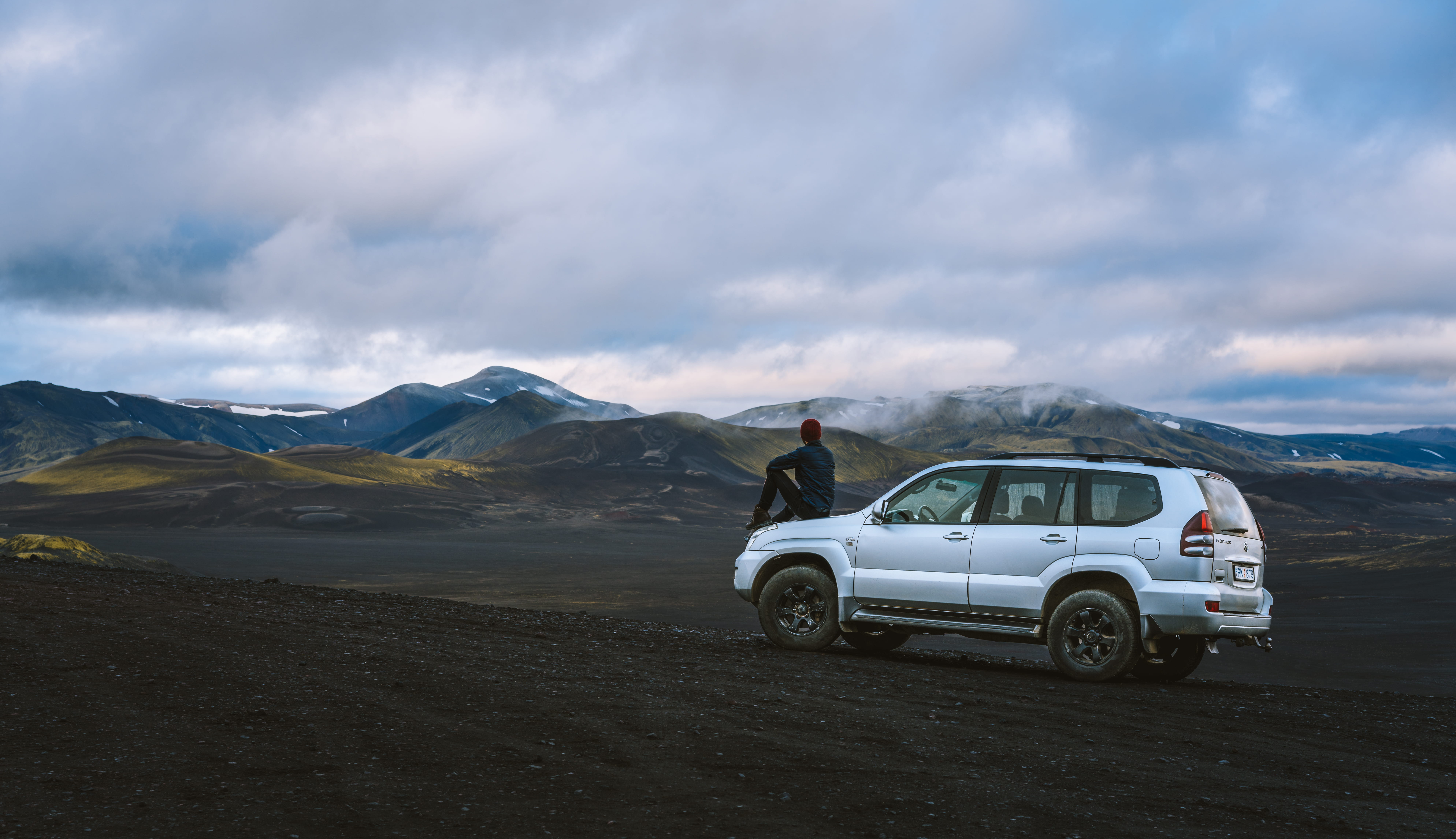 non-urban scene, transportation system, landscape, mountains, cloudy, SUV, sitting, remote, transportation, outdoors, holiday, cloud - sky, vacations, 4x4, HD Wallpaper