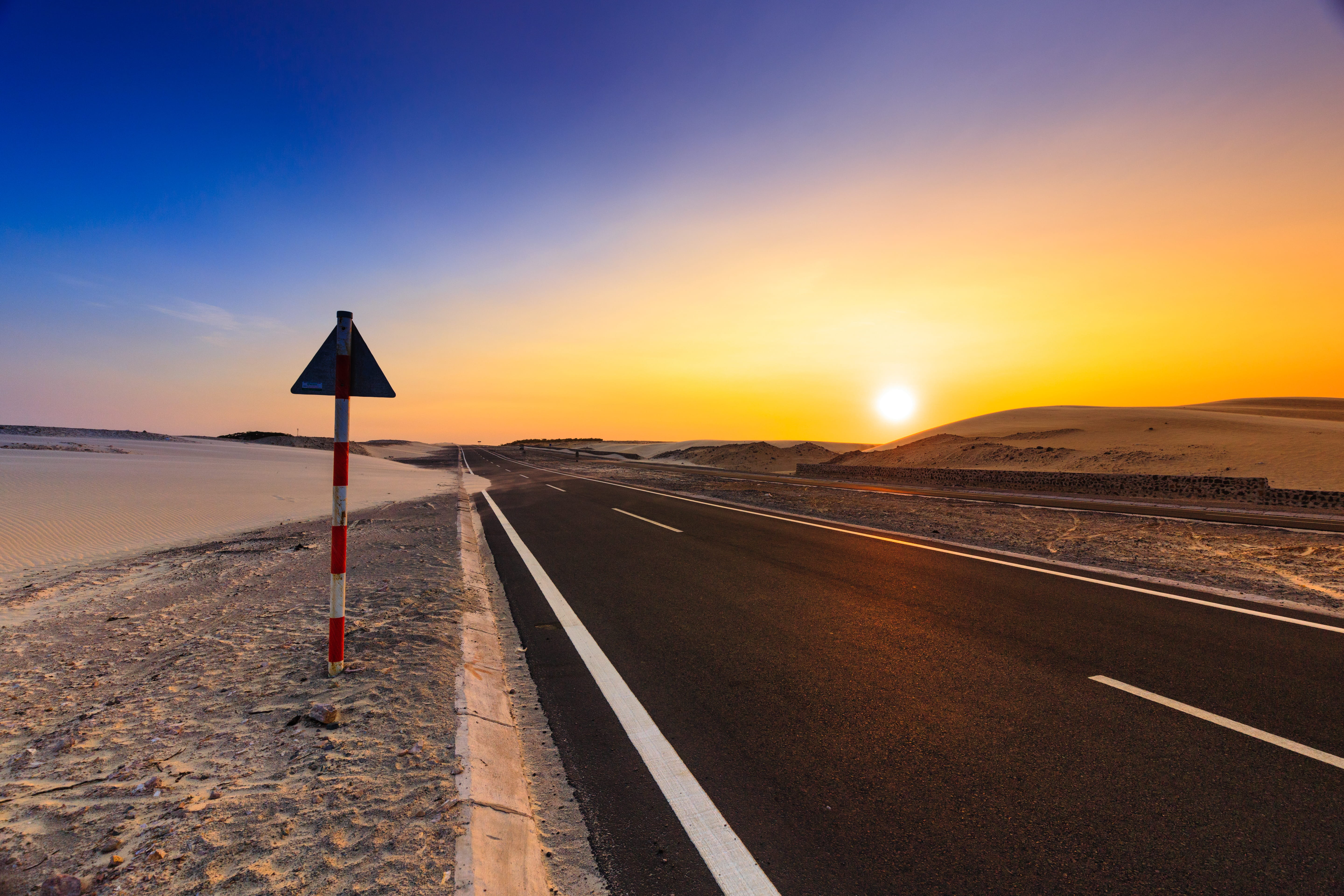 sun, direction, lane, tranquility, dusk, asphalt, sign, symbol, signage, road marking, street, communication, sand, sunset, evening, transportation, 5K, HD Wallpaper