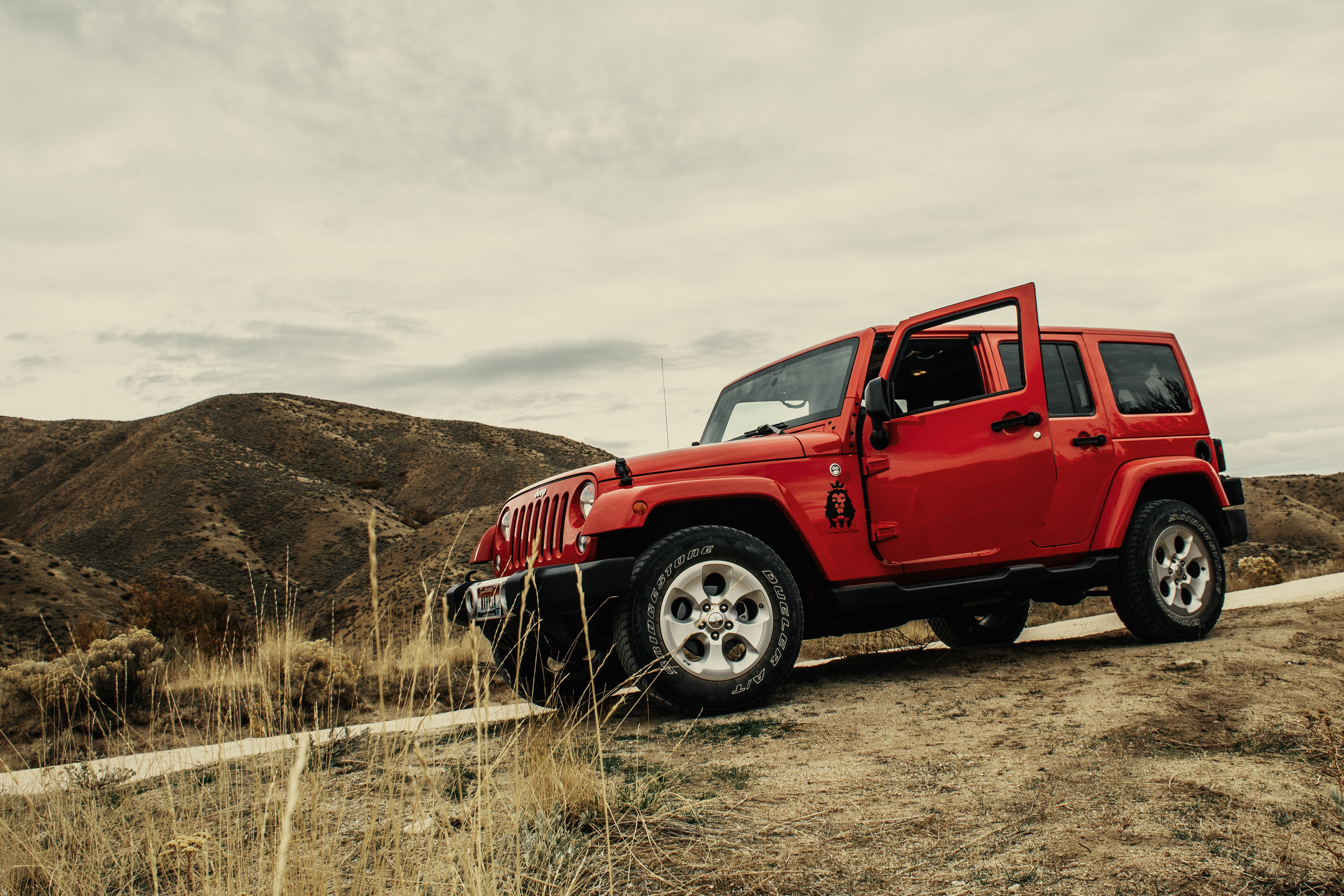mountain, road, automotive, field, land vehicle, stationary, desert, sky, land, wheels, wheel, tyres, scenics - nature, tires, transportation system, landscape, HD Wallpaper