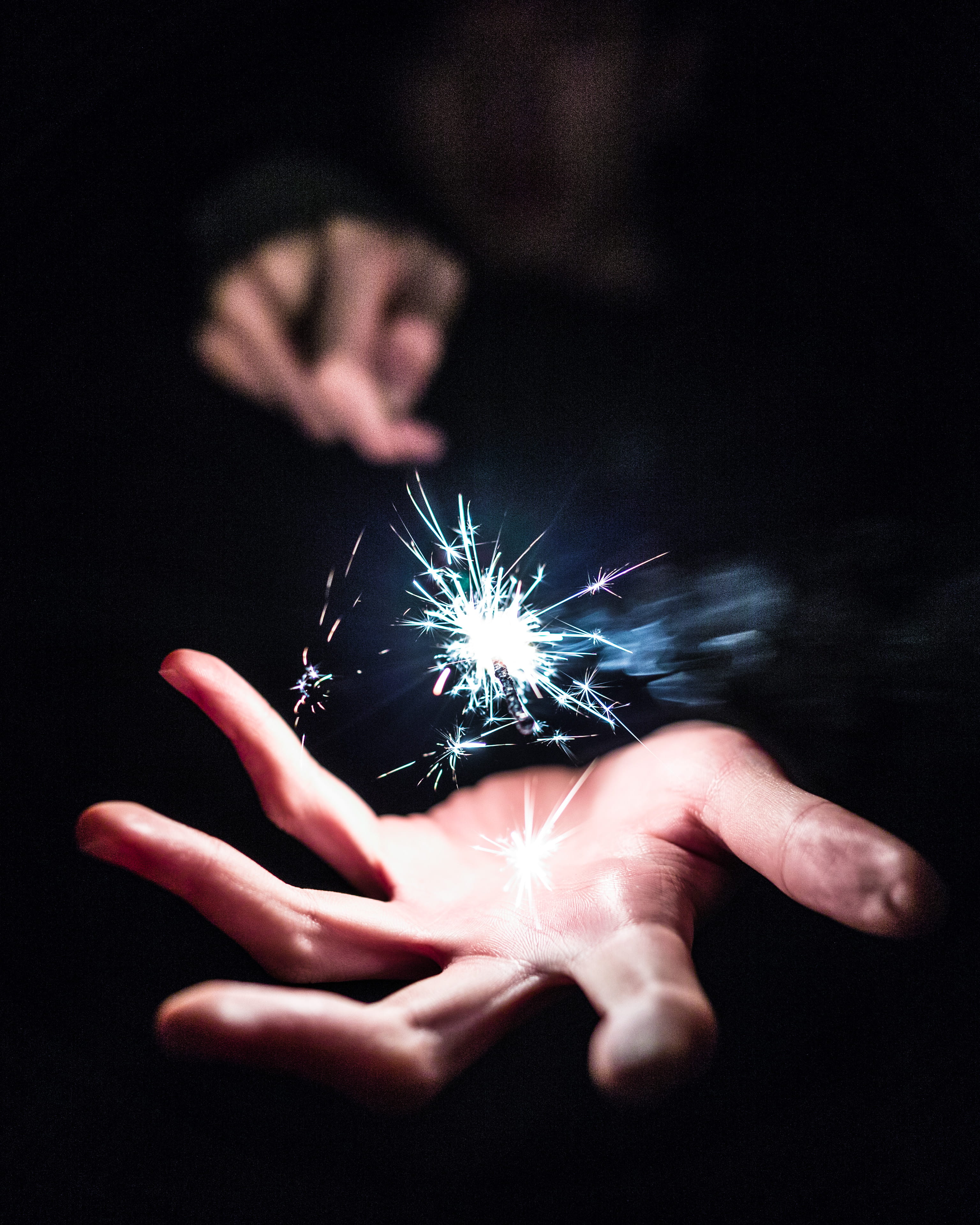 human finger, firework - Man Made Object, focus, fire - Natural Phenomenon, light, motion, firework, long exposure, human body part, photography, leisure activity, Phone HD Wallpaper