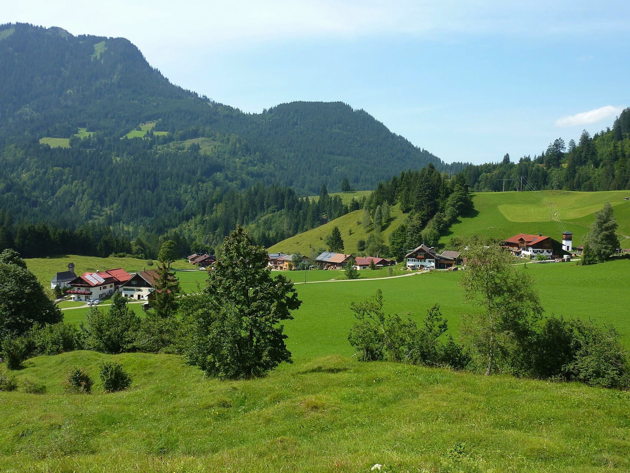 homes, built structure, hinterstein, outdoors, countryside, building, village, meadow, field, clouds, growth, sky, spring, beauty in nature, non-Urban Scene, HD Wallpaper