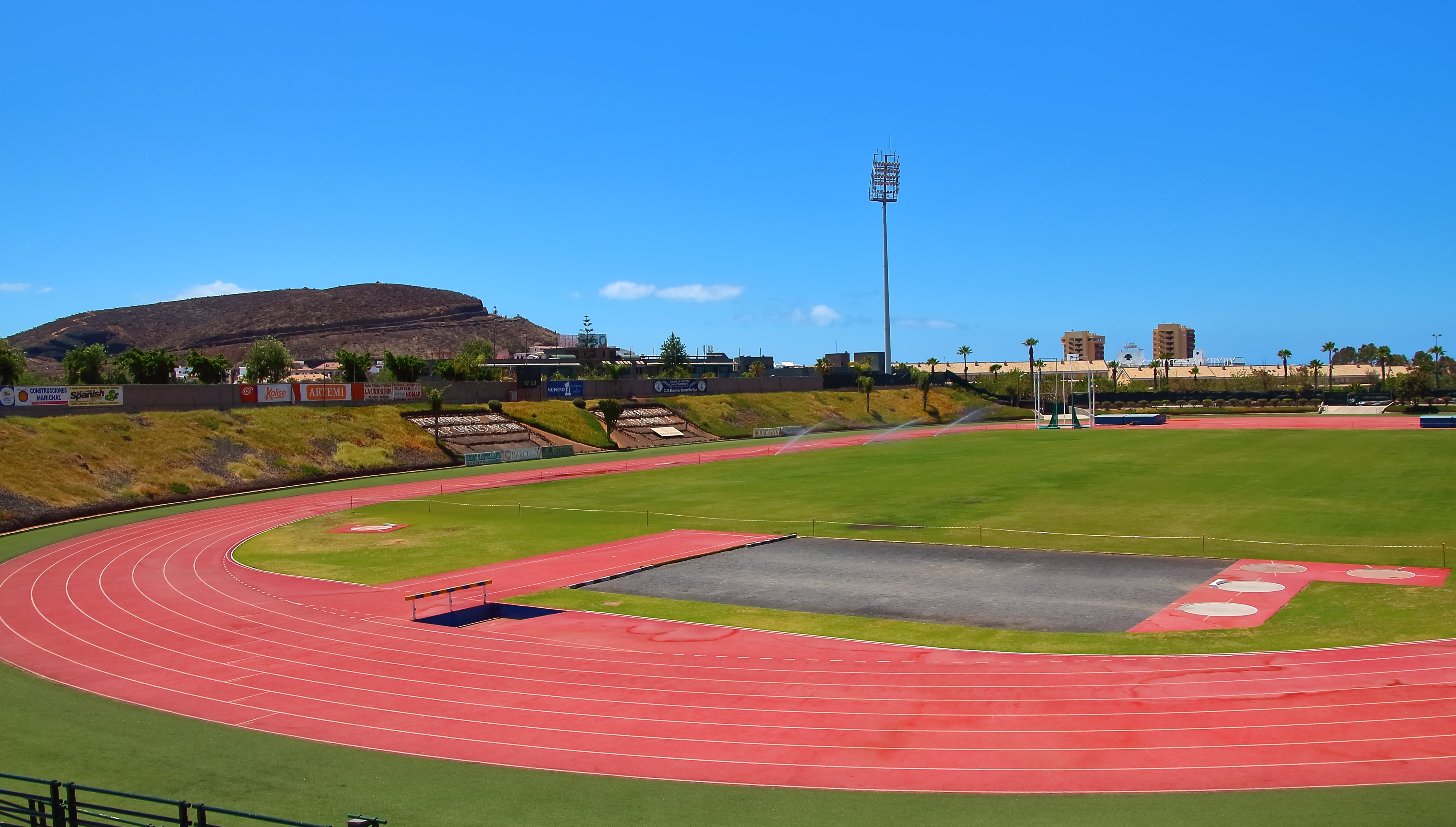 stadium, track and field, field, city, built structure, clear sky, football, architecture, harrows, nature, flag, grass, sky, blue, plant, travel destinations, HD Wallpaper