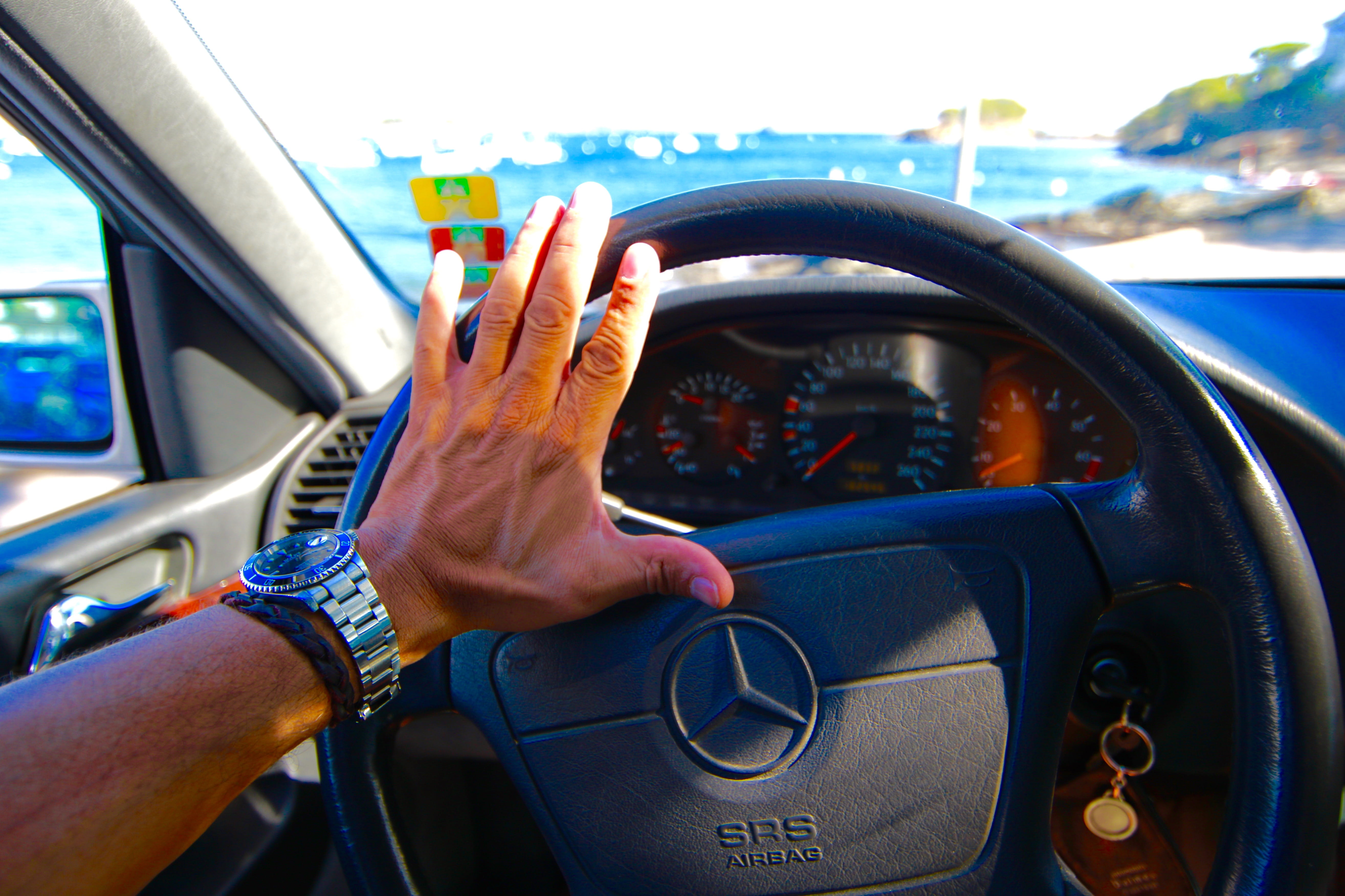 car interior, steering wheel, coast, drive, horizon, watch, men, transportation, hand, mercedes, human hand, 5K, human body part, dashboard, motor vehicle, HD Wallpaper