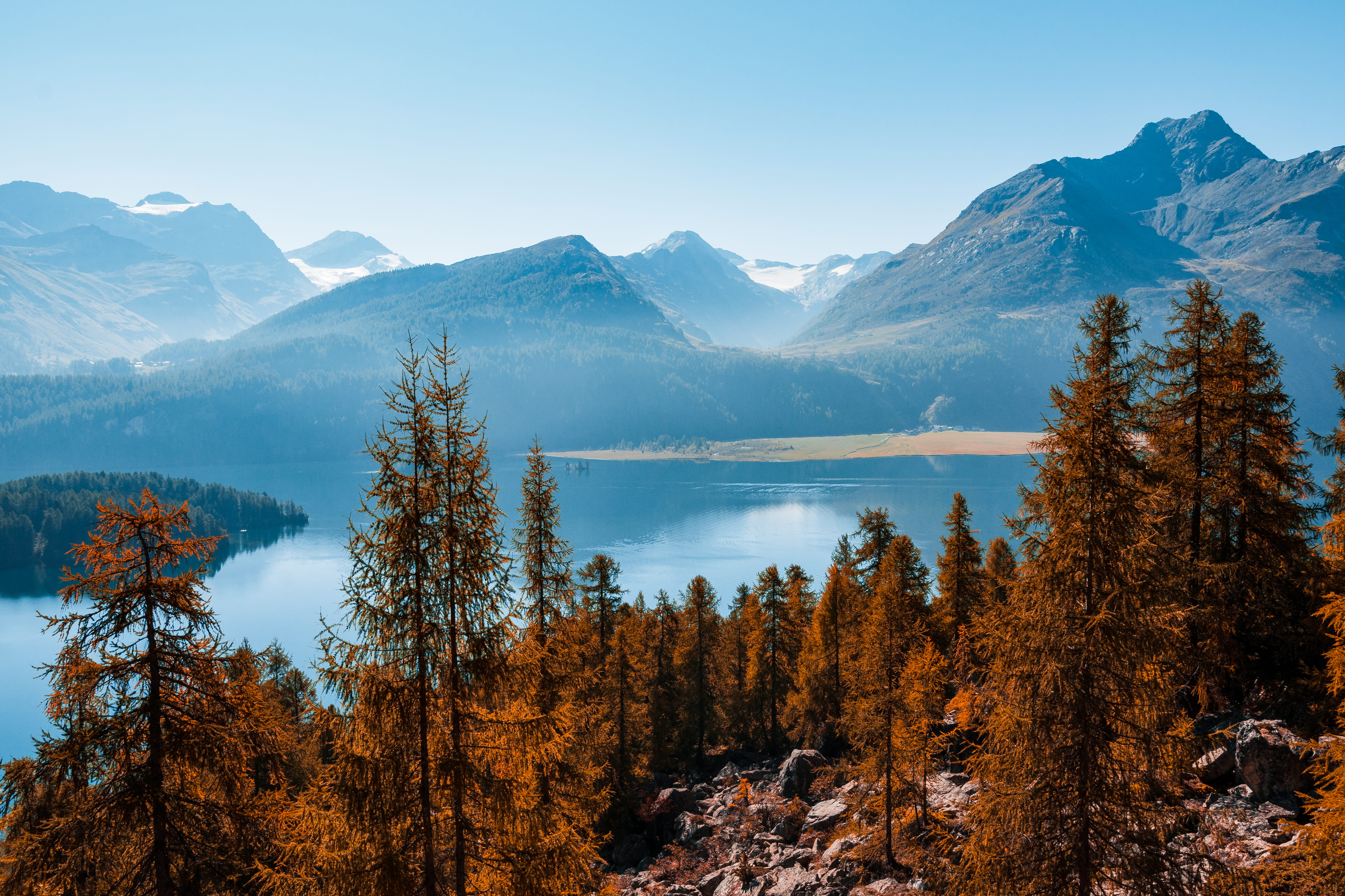 mountain peak, daytime, no people, outdoors, tree, pine tree, land, larch, beauty in nature, forest, water, engadin, idyllic, sky, coniferous tree, non-urban scene, HD Wallpaper