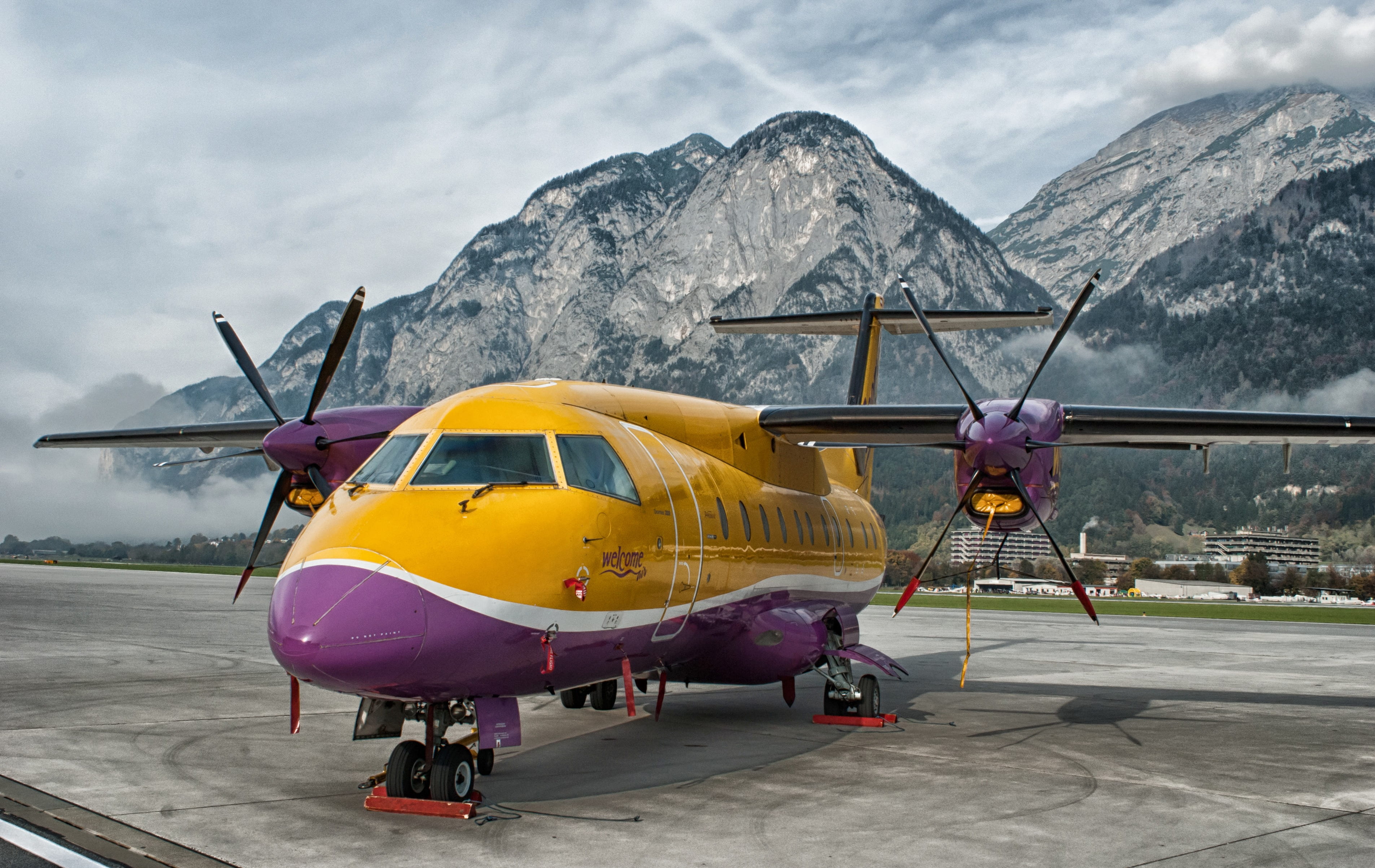 airport runway, clouds, austria, yellow, transportation, airport, outside, beauty in nature, travel, innsbruck, no people, outdoors, cockpit, air vehicle, HD Wallpaper