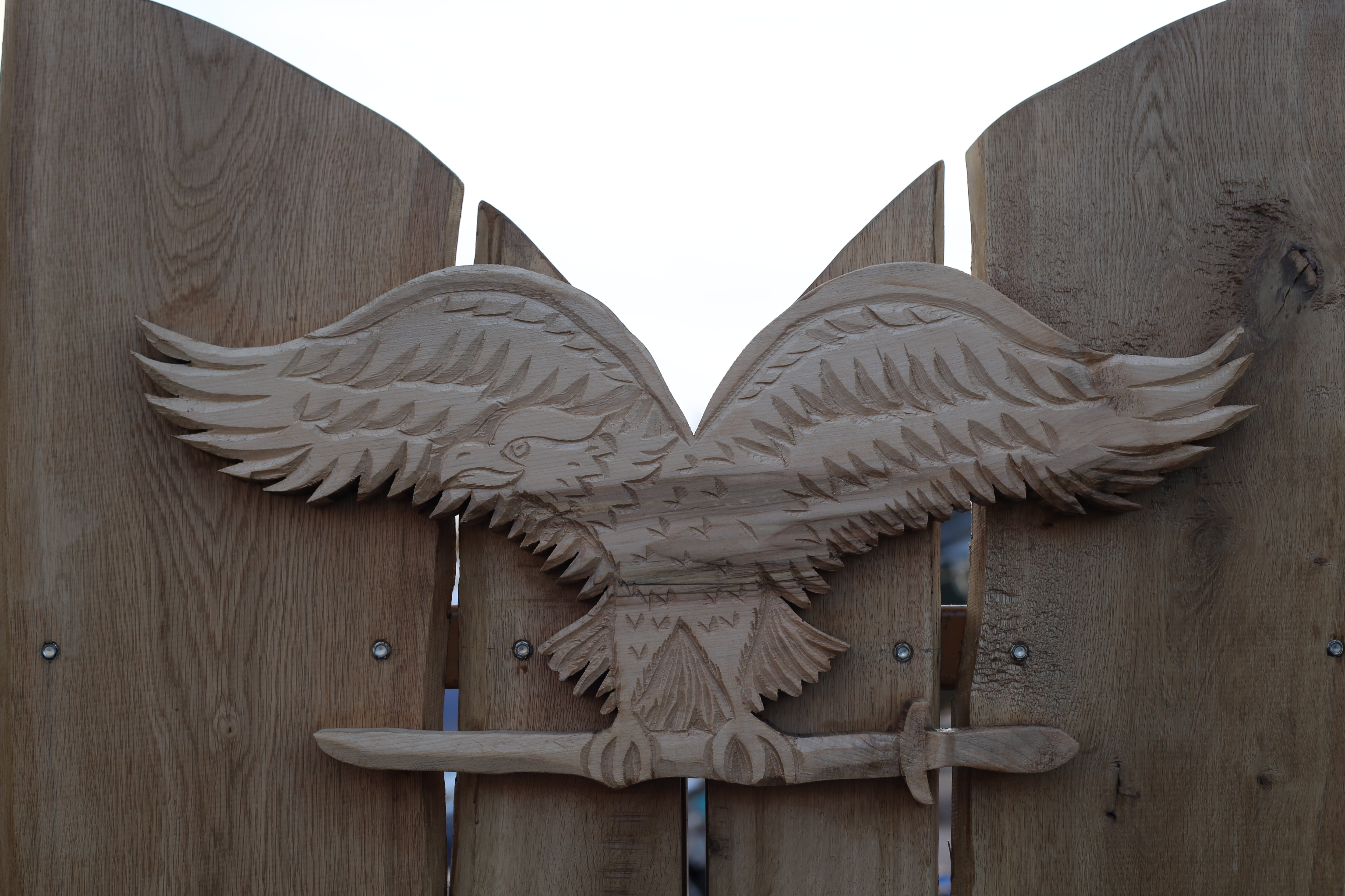 built structure, safety, fence, angel, wood, carving - craft product, sky, 5K, sas, day, coat of arms, turul bird, craft, wings, close-up, animal representation, HD Wallpaper