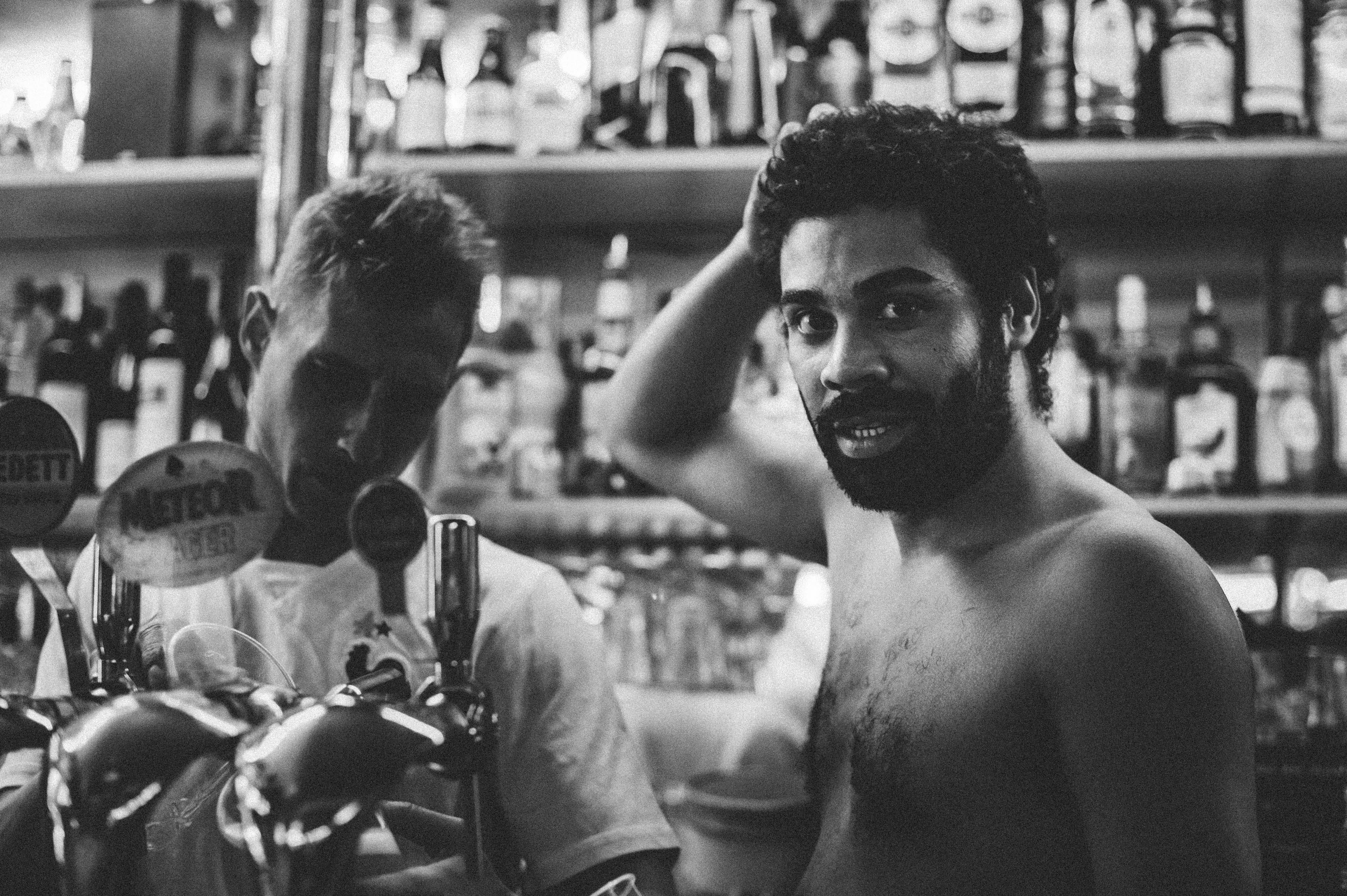 waist up, front view, man, standing, human, men, shelf, young adult, portrait, real people, black and whit, bartender, drink, bar - drink establishment, HD Wallpaper